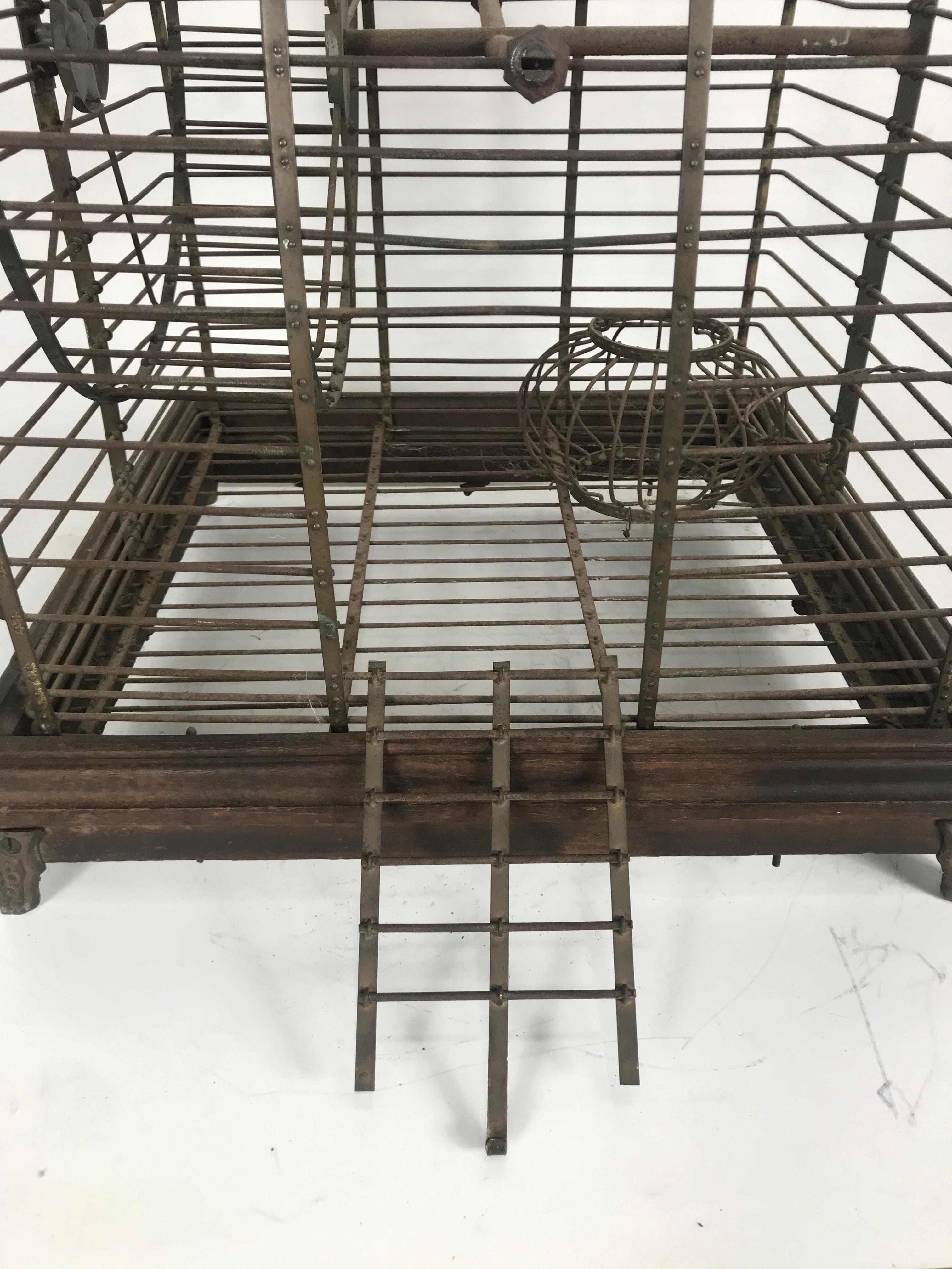 Unusual Turn of the Century Industrial Brass Small Animal Cage with Wheel For Sale 1
