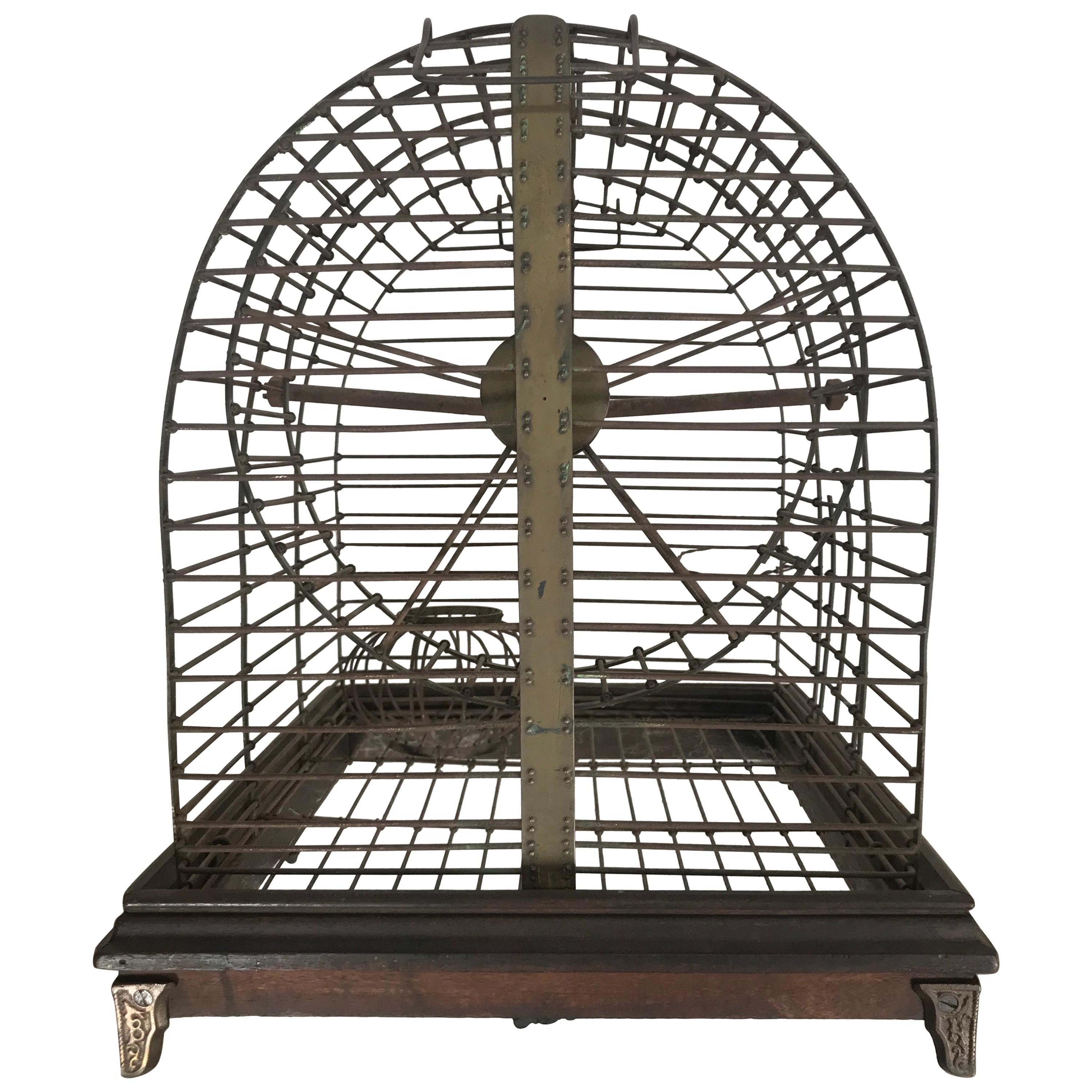 Unusual Turn of the Century Industrial Brass Small Animal Cage with Wheel For Sale