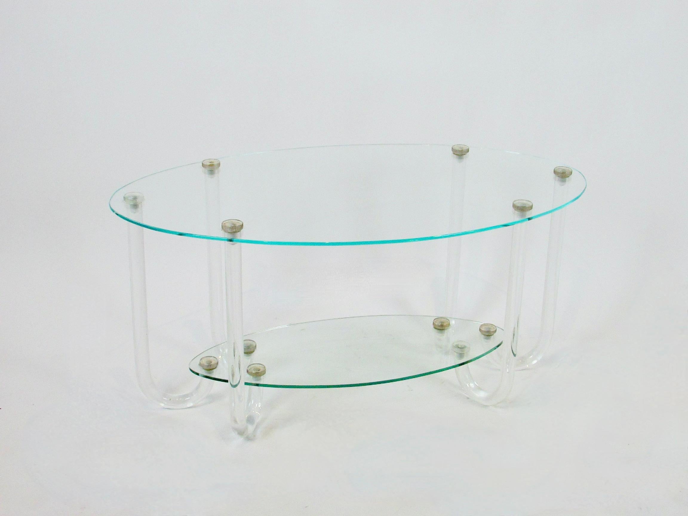American Unusual Two Tier Hollywood Regency Oval Top Table on Six Lucite Legs For Sale