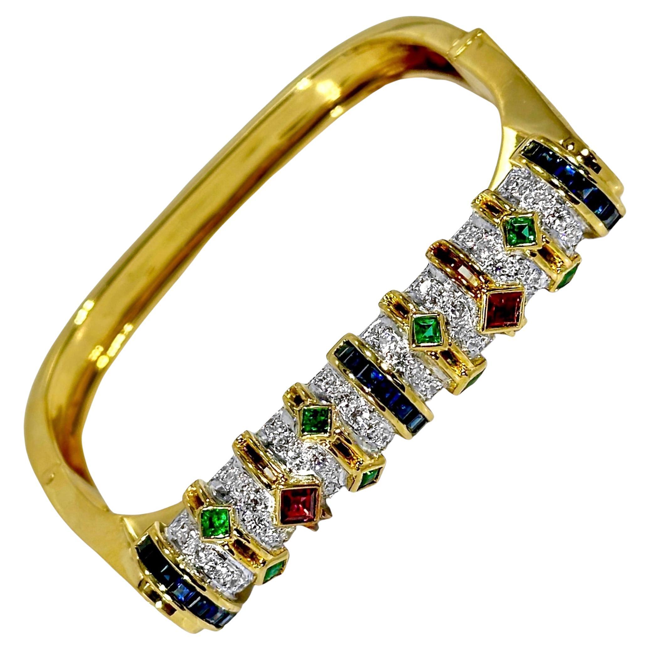 Unusual U-Shaped 18K Yellow Gold Diamond, Ruby, Sapphire, and Emerald Bangle 