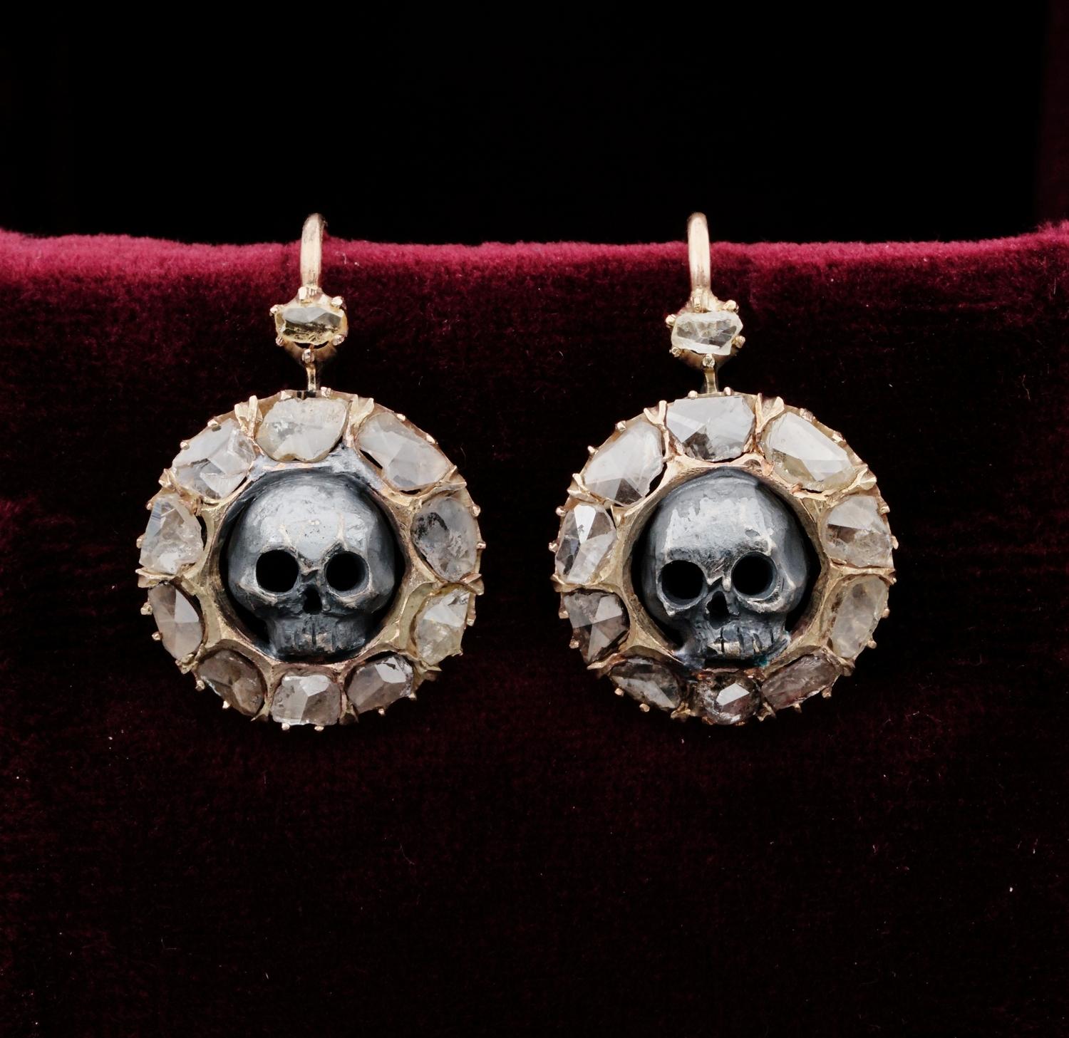 Vanitas

Rare and unusual, authentic Victorian Cluster earrings, beautifully hand crafted of solid 18 Kt gold, in the typical design in vogue at the time
They are beautifully surrounded by flat Rose cut Diamonds spreading as much as 2.30 Ct -