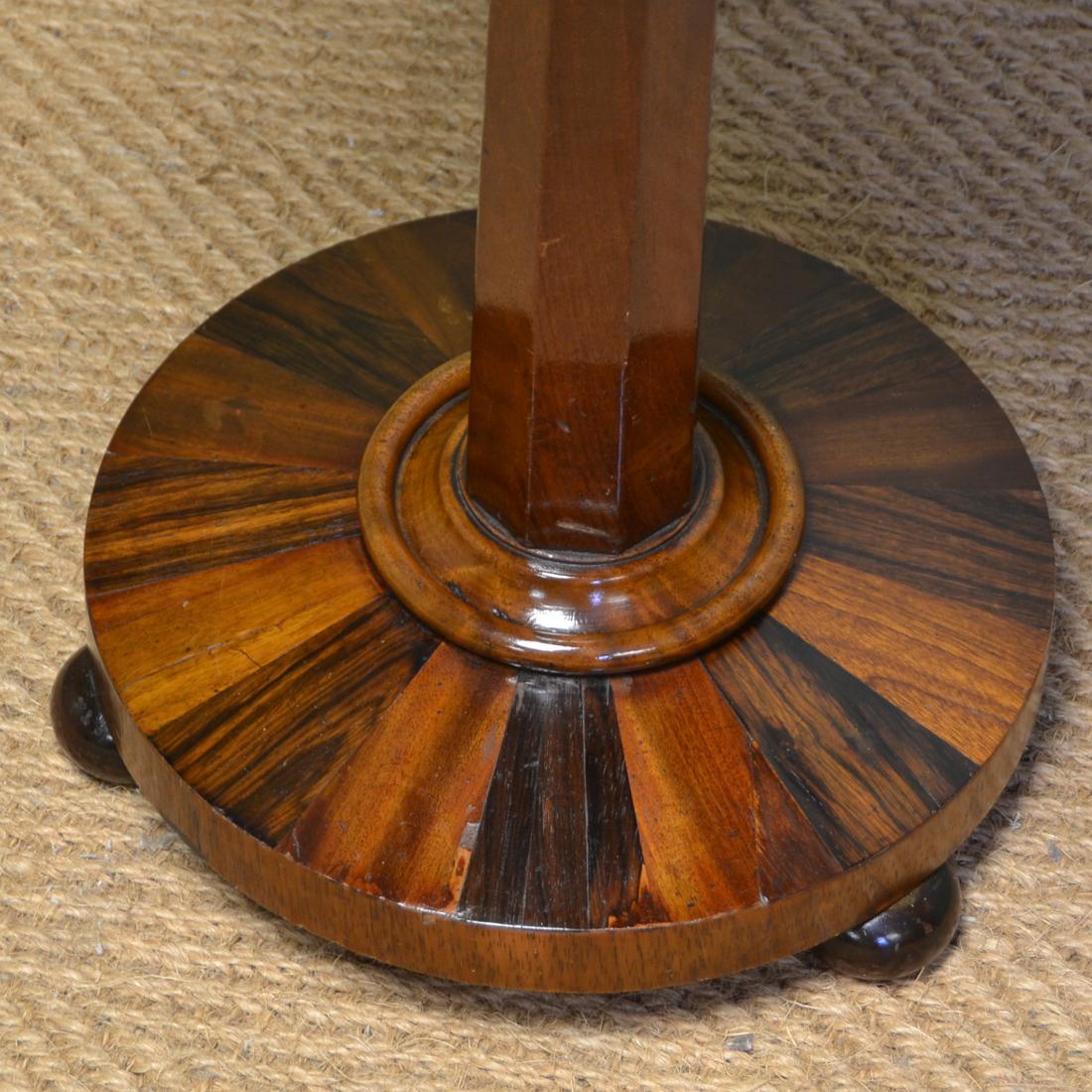 Unusual Victorian antique specimen occasional table

This unusual antique specimen occasional table has a lovely octagonal top with the most spectacular inlays and dates from circa 1870. It stands on an octagonal tapering pedestal with circular