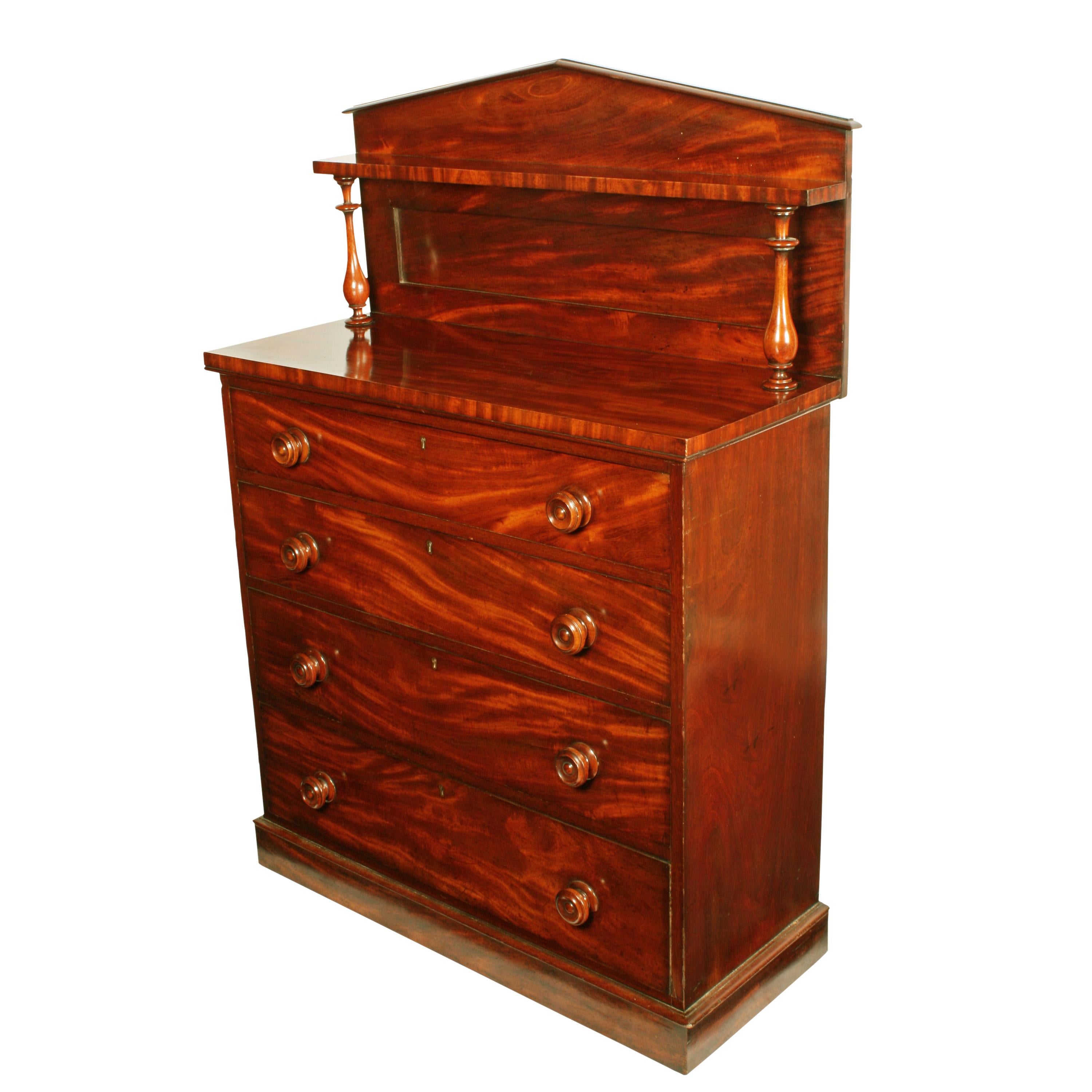 Unusual Victorian mahogany chest


A very unusual Victorian mahogany narrow chest of drawers.

The chest has four graduated pine lined drawers with knob handles and original blue sugar paper in the drawer bottoms.

The top of the chest has a