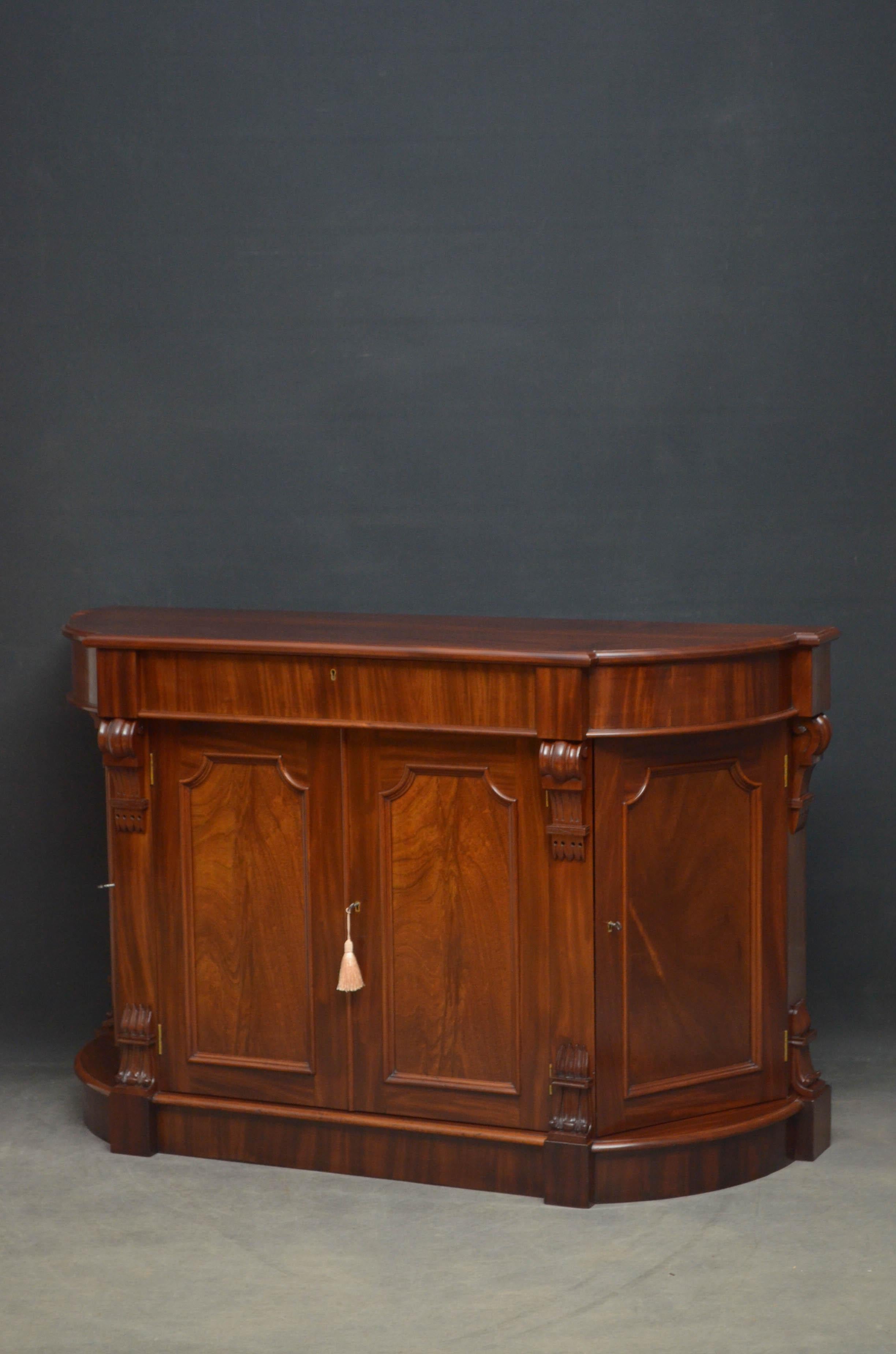 Sn4545, fine quality and very unusual Victorian, bow fronted sideboard in mahogany, having superb, figured mahogany top above a frieze drawer and 4 flamed mahogany panelled doors, all fitted with original working locks and keys and flanked by drop