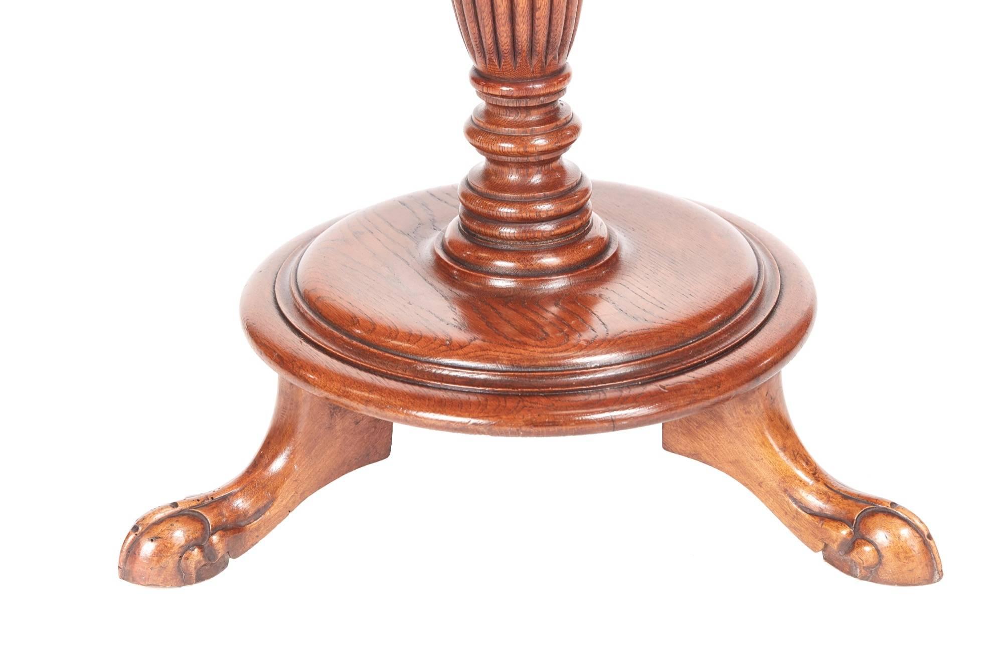 Unusual Victorian oak hat and coat stand, with revolving top and six original brass hooks, lovely turned reeded column on a round platform base raised on three shaped legs with claw and ball feet
Lovely color and condition
Measures: 18