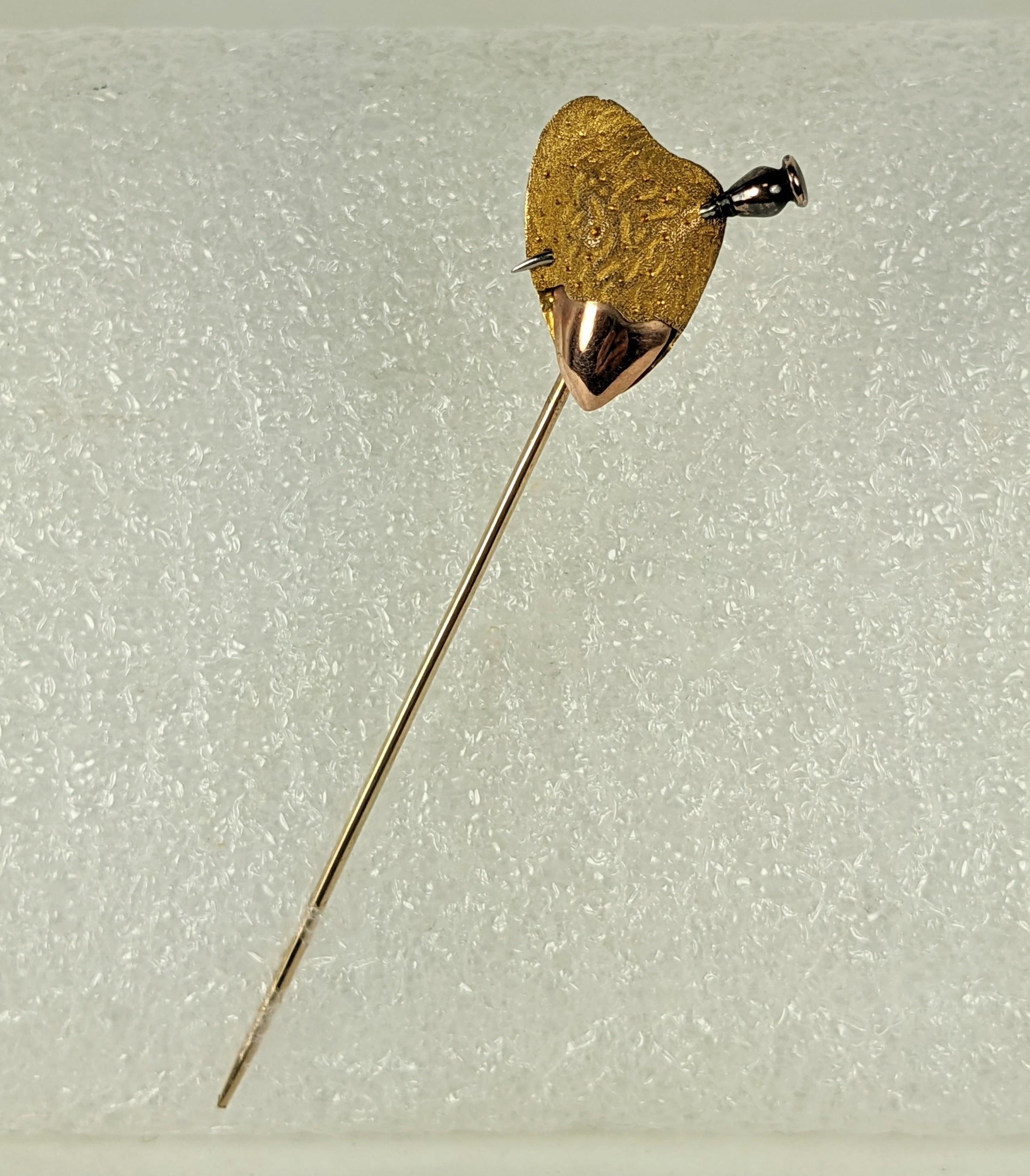 Unusual Victorian Pecan Stickpin in 14k gold from the 19th Century. Hand crafted of textured yellow gold, pink gold with a white and pink gold spike. Unusual subject matter, were not sure of the meaning but beautifully crafted miniature from the