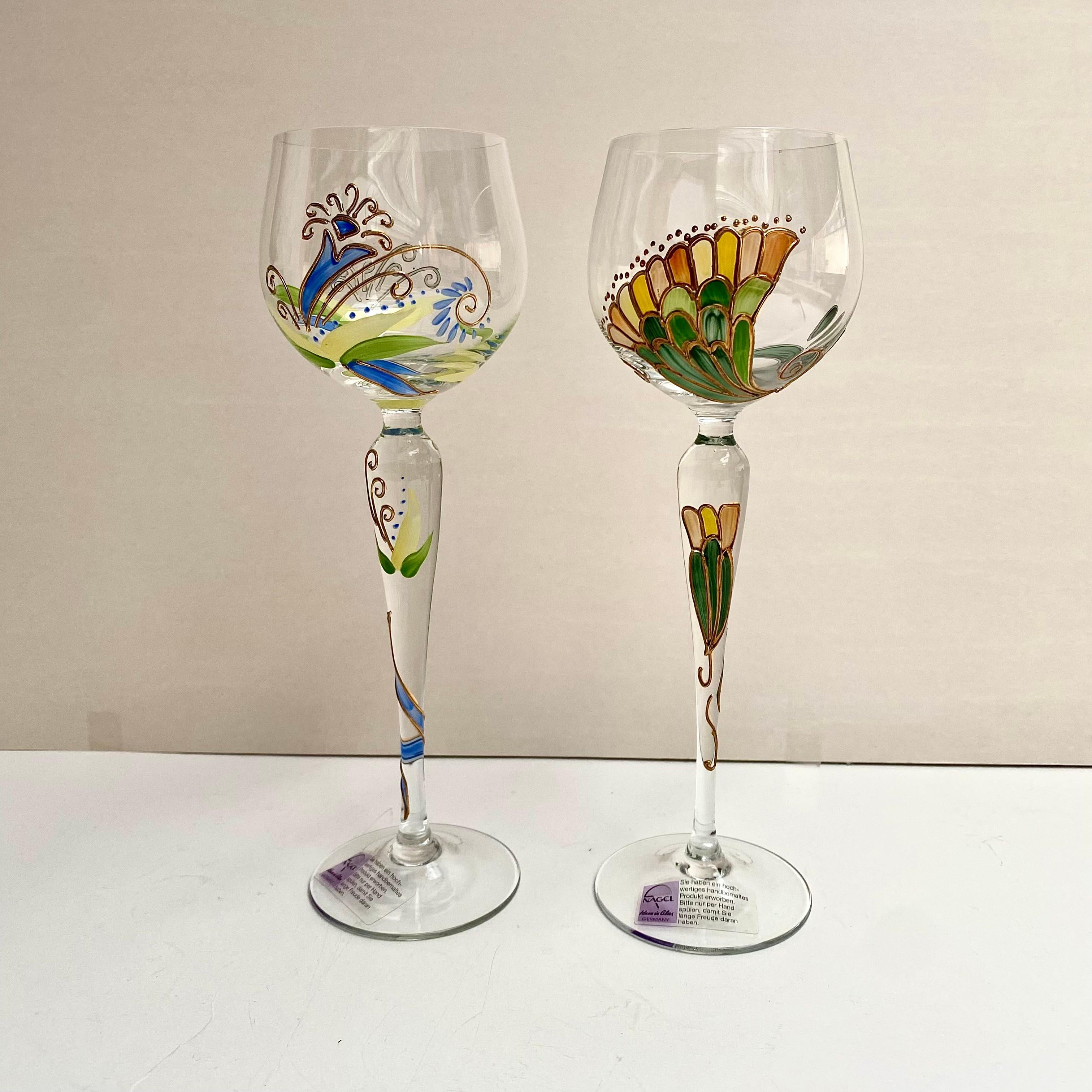 Vintage crystal glasses from the premium German brand NAGEL, 1980s.

Hand-Decorated and Mouth-Blown set of 2 wine glasses from the “Romantic Poetry” collection. 

You will enjoy using truly beautiful and elegant tableware. With them you can