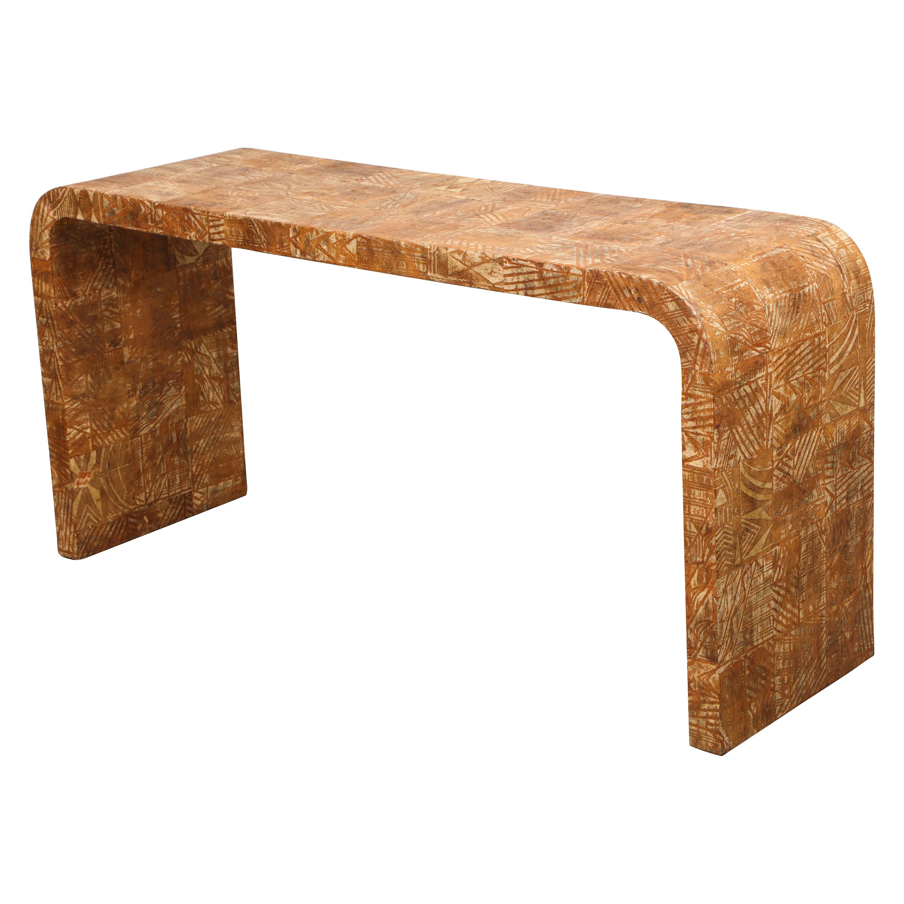 Unusual vintage hand-stenciled bark console table.