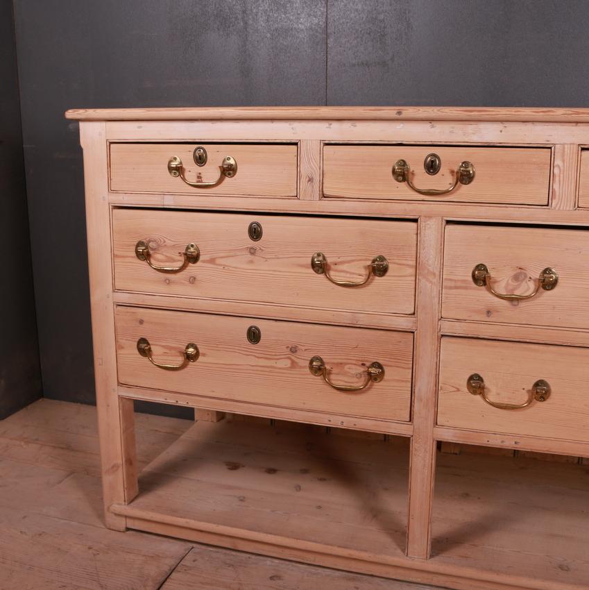 Unusual early 19th century Welsh bleached pine dresser base, 1820.

Dimensions:
59.5 inches (151 cms) wide
23.5 inches (60 cms) deep
37.5 inches (95 cms) high.