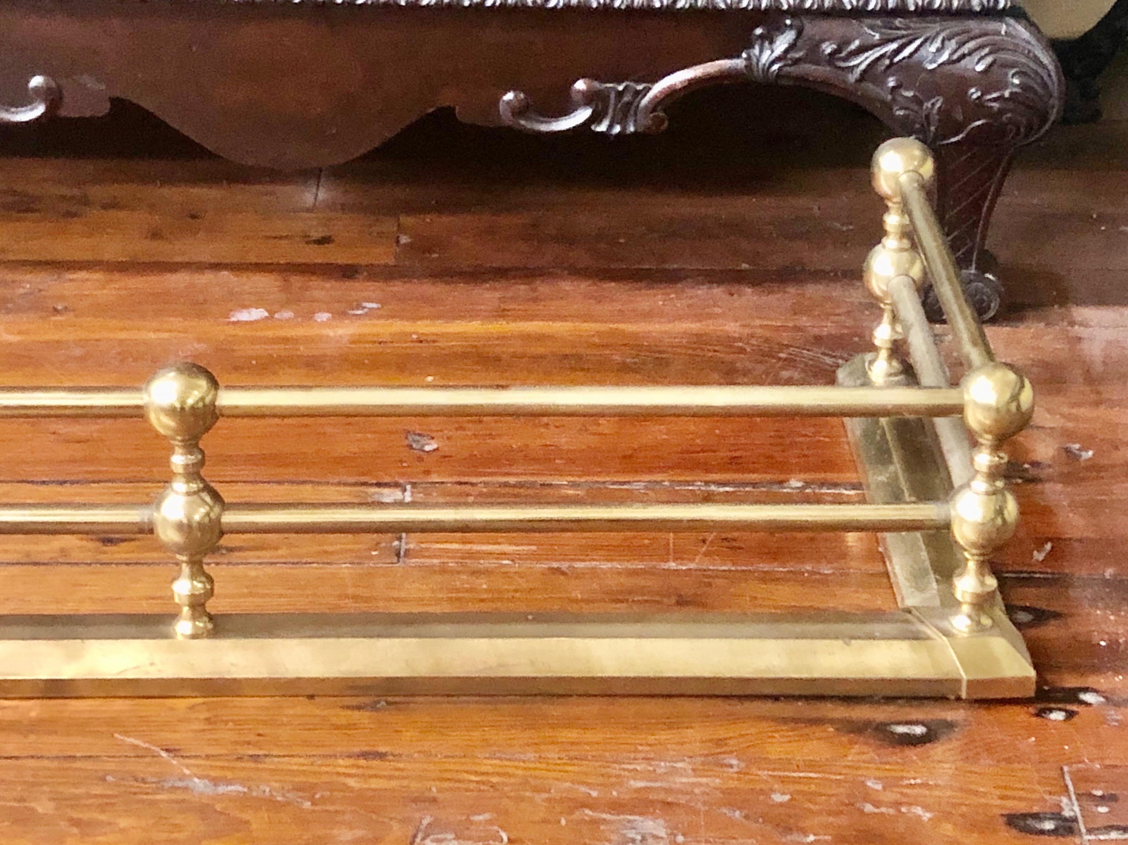 English Unusually Long Early 20th Century Solid Brass Rail Style Fireplace Fender