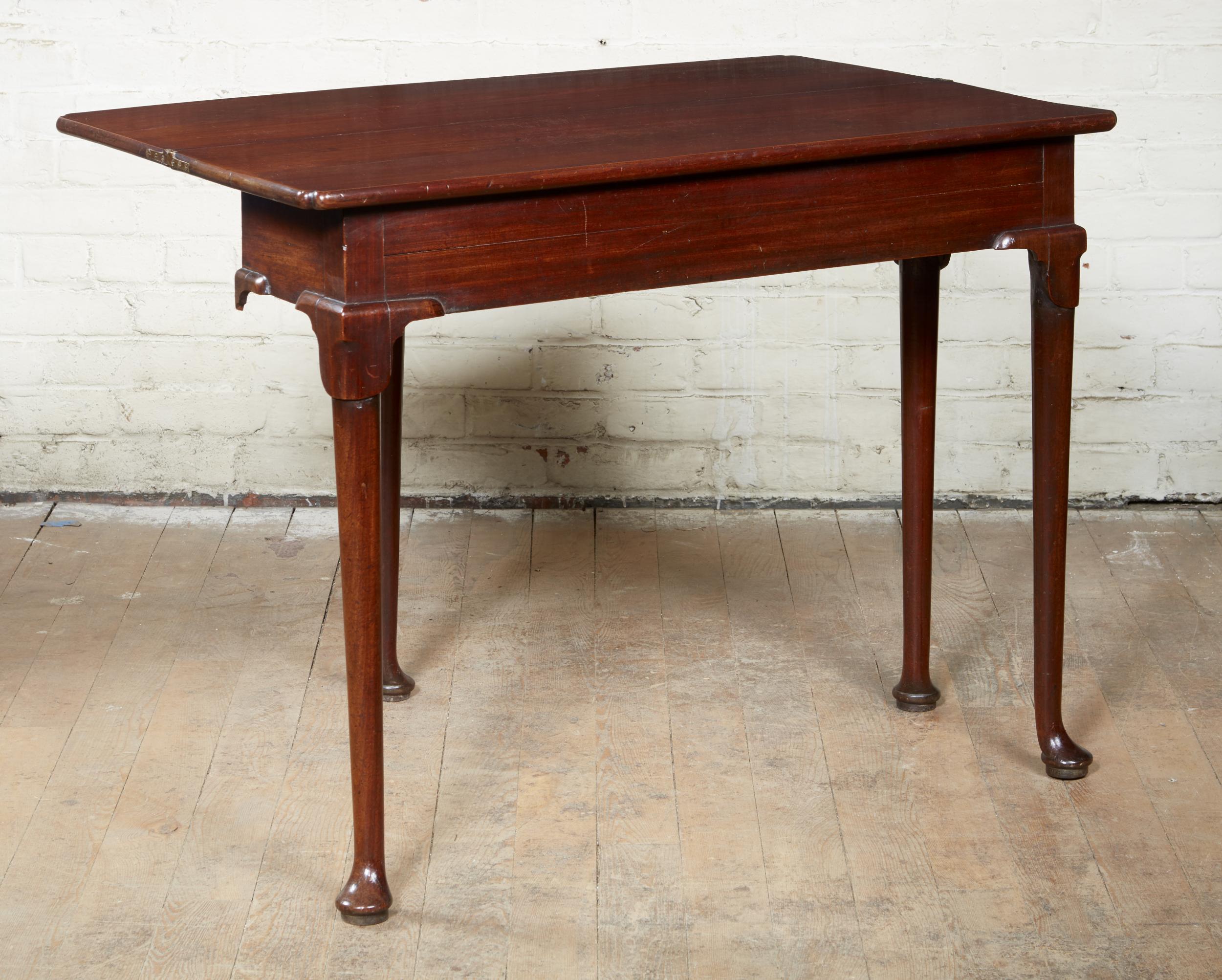 Fine George II mahogany card table of unusually narrow scale, the top with reentrant (
