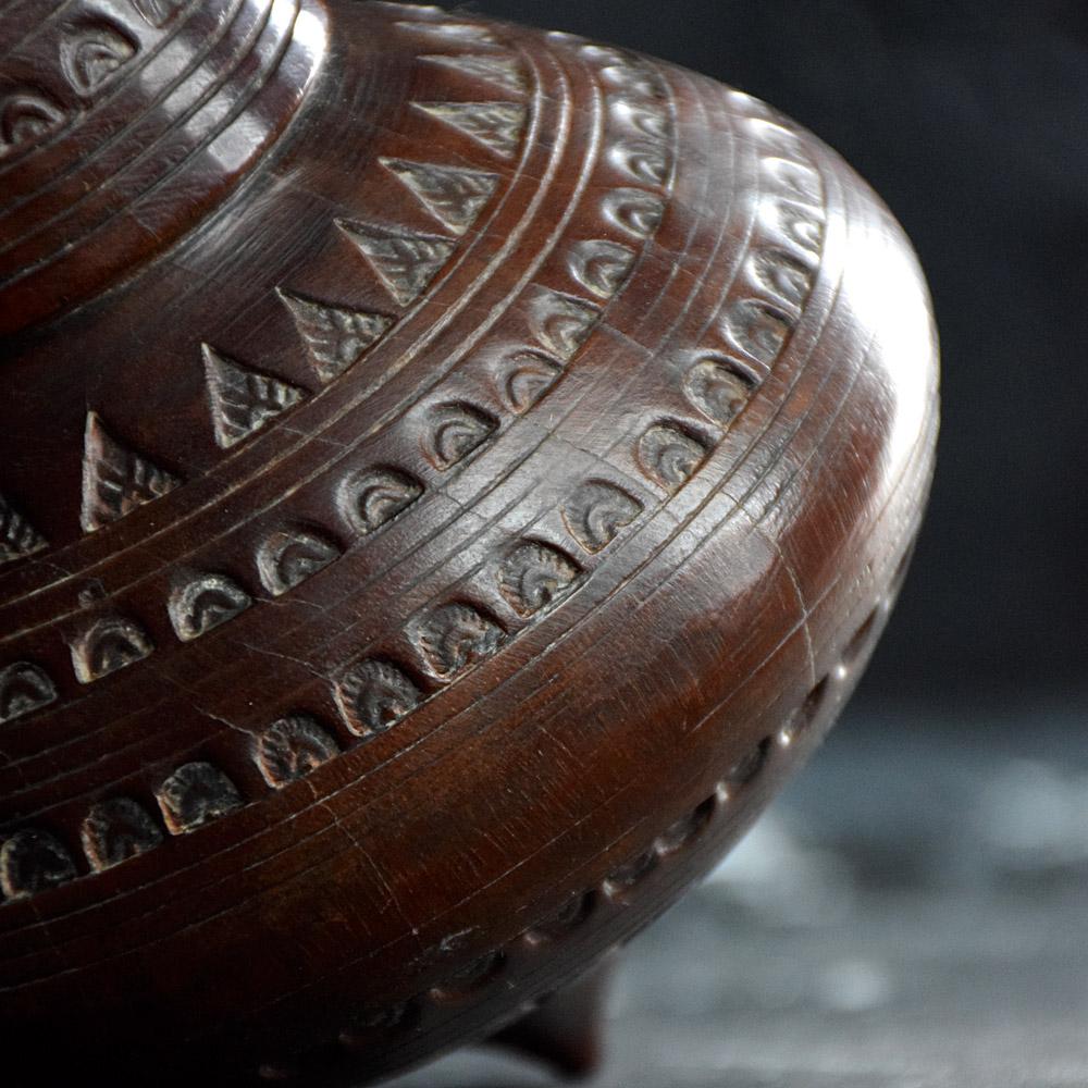 Unusually Oversized Folk art Spinning Top 

An unusually oversized late 19th Century hand carved folk art spinning top. Detailed with Welsh style geometric shape patterns. Made from a hard wood with a small metal pin at the base where spun.