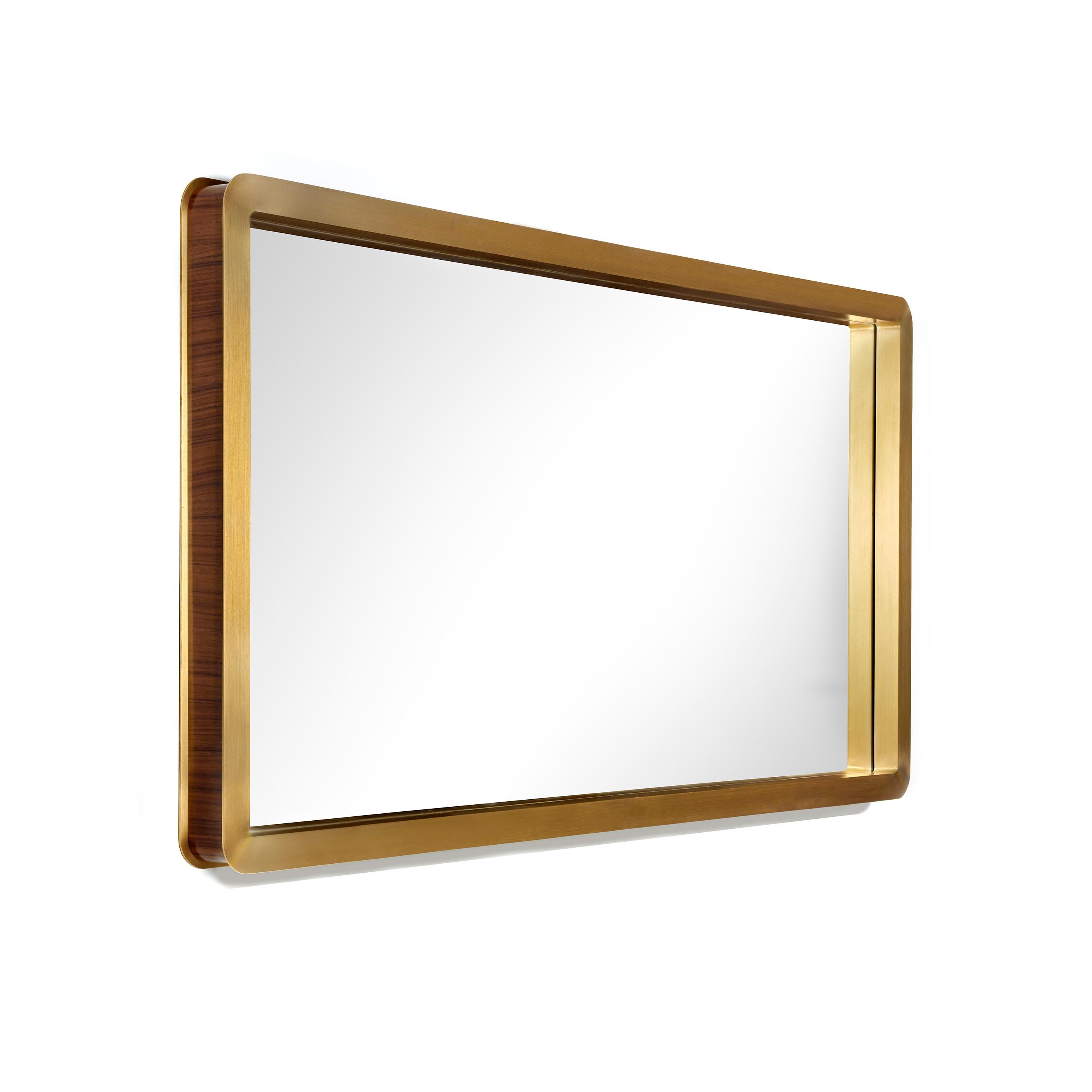 A person’s identity isn’t an immediate perception but, instead, it has to be unveiled. The unveil mirror portraits the unknowns of human Identity.
The brass frame around the mirror means that first look to someone, when, sometimes, we wrongly