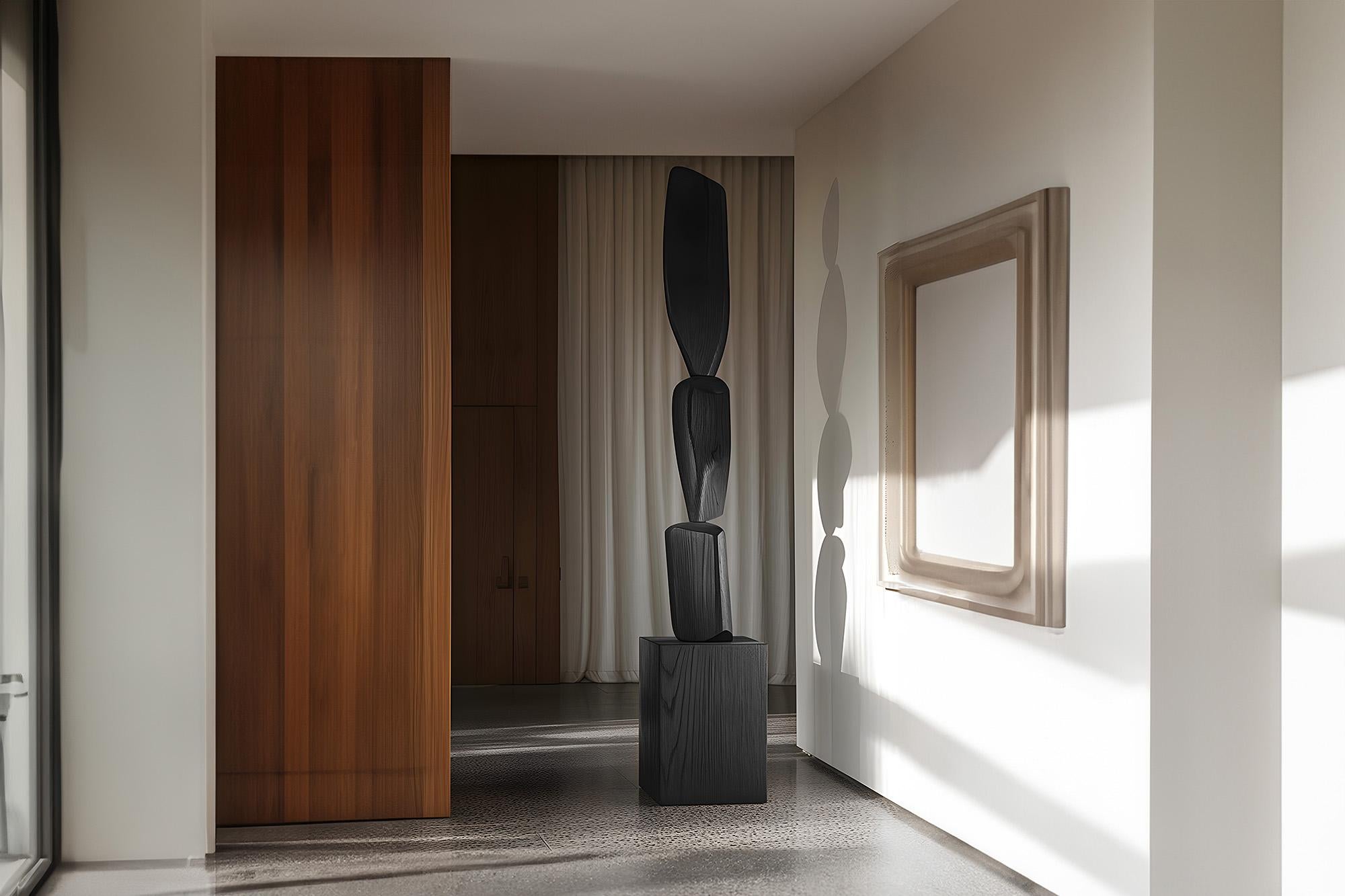 Unveiling Modern Elegance, Dark Black Solid Wood, Still Stand No89 by NONO

——

Joel Escalona's wooden standing sculptures are objects of raw beauty and serene grace. Each one is a testament to the power of the material, with smooth curves that flow