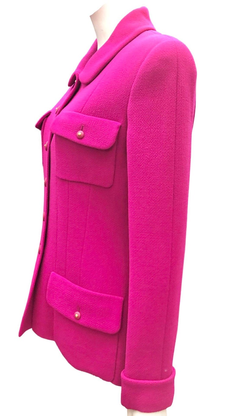 - Unworn Vintage Chanel fuchsia boucle wool jacket from A/W 1995 collection.

- Four front pocket button closure. 

- Size 42 but it fits like 36 to 38.



