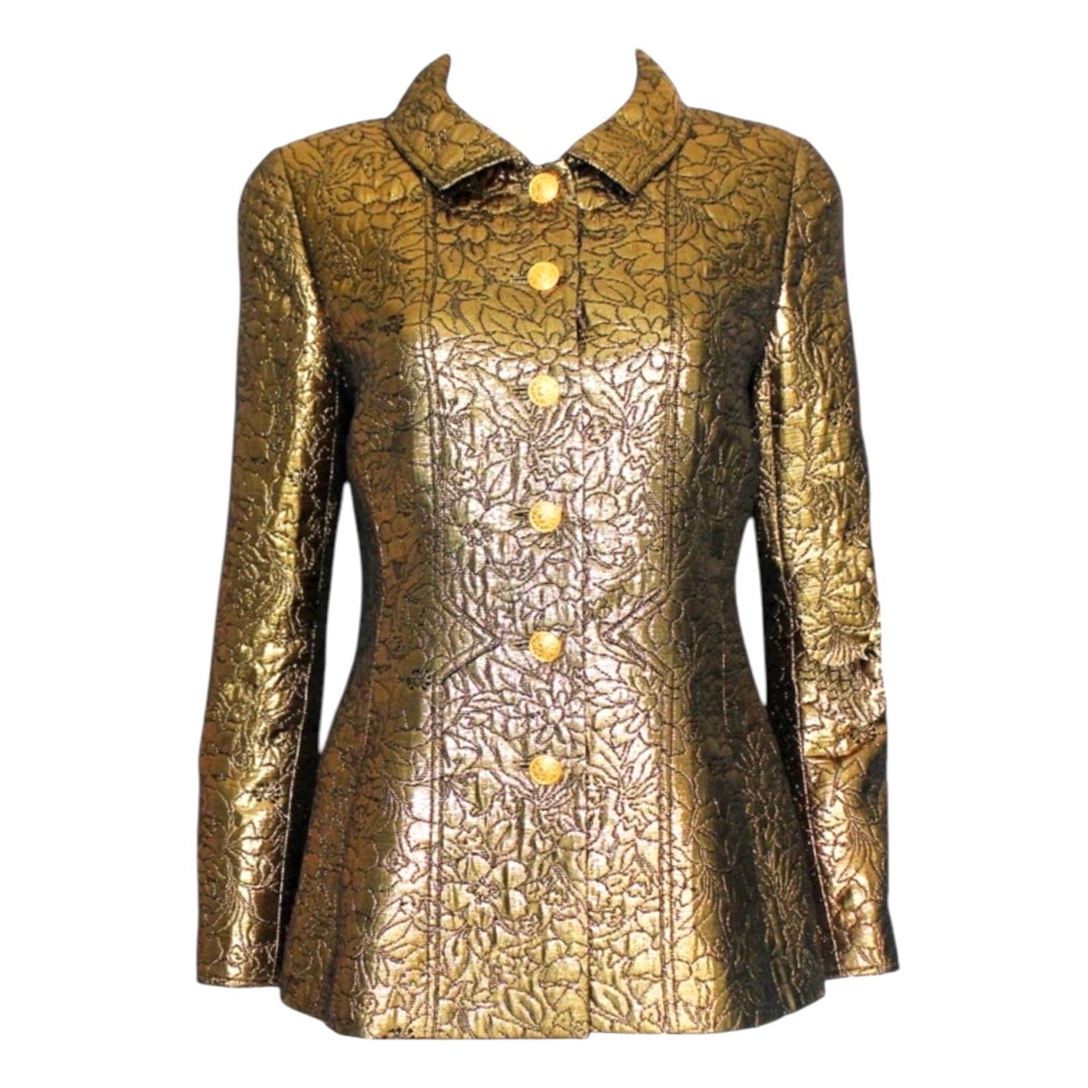 A true icon designed by Karl Lagerfeld for Chanel
Golden metallic jacket
3D structure
Golden buttons with CC logo marked „Chanel“ on back
Fully lined 
Part of the AD campaign shot by Karl Lagerfeld
Amazing condition
Made in France
Dry Clean