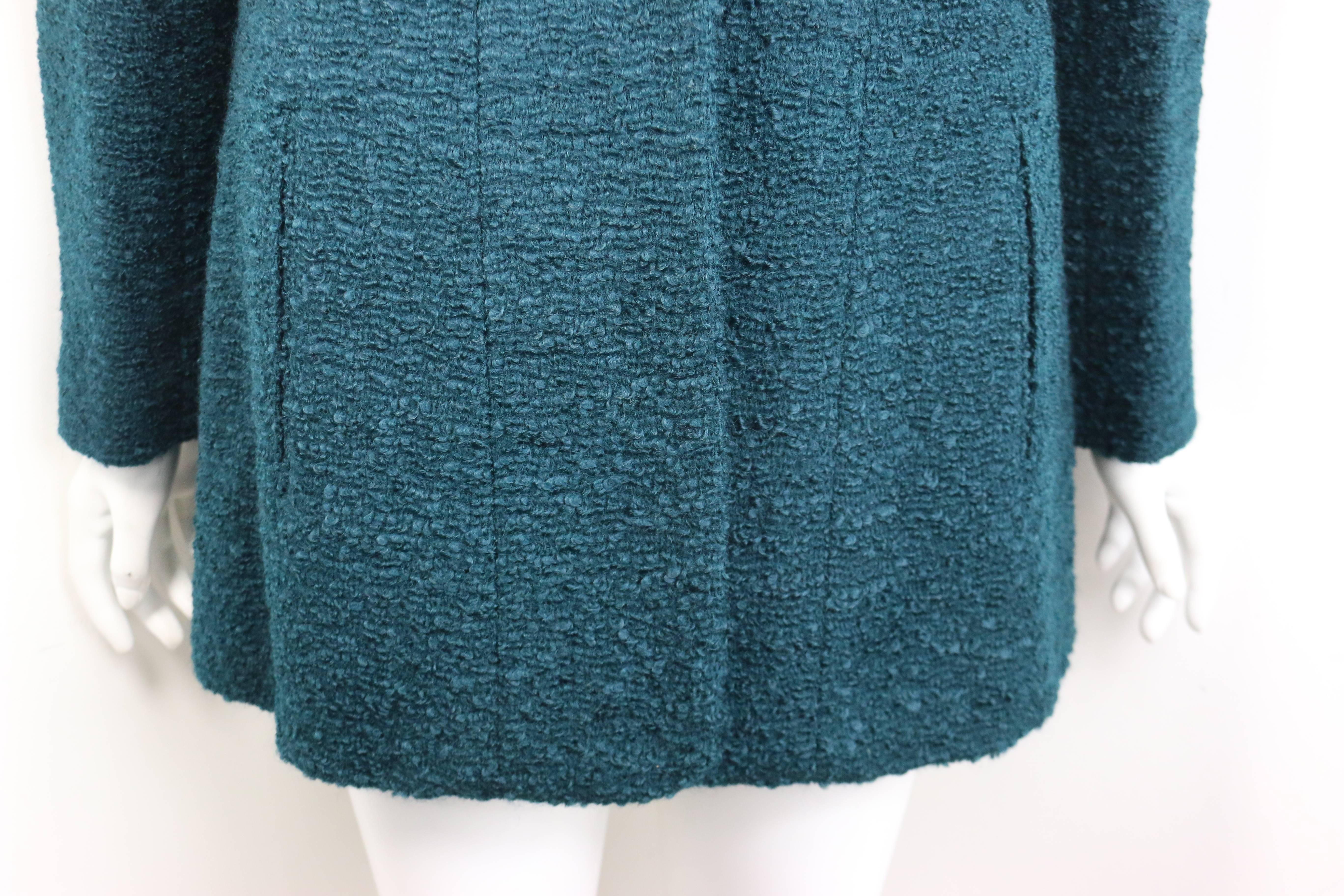 - Chanel green mohair and boucle wool jacket from Fall 1997 Collection. 

- Two front open pockets with silver 