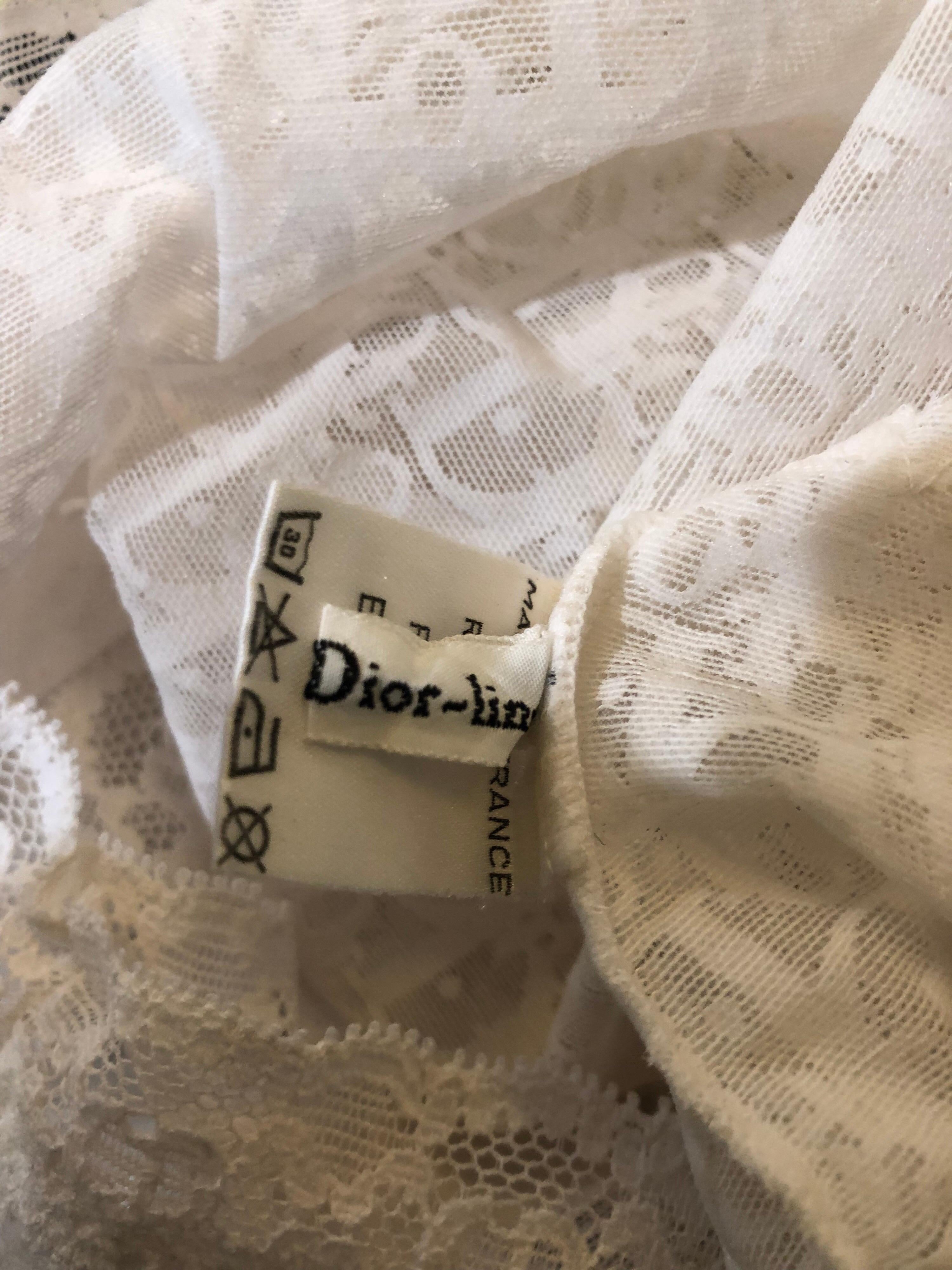 Sexy never worn 90s vintage CHRISTIAN DIOR white sheer logo lace monogrammed lowrise hot pants! Flattering boy short style! Features the DIOR logo throughout, with CD monogrammed at the waistband. In great unworn condition. Made in