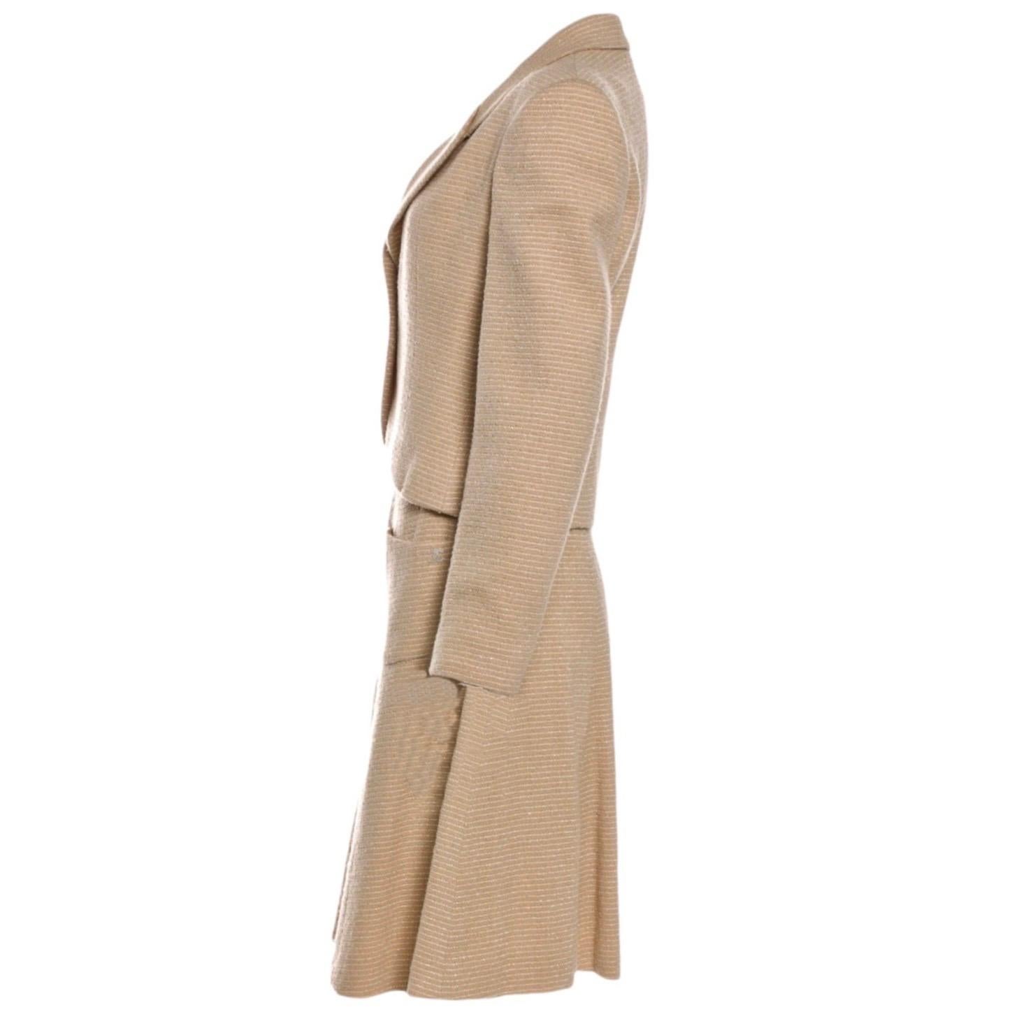 A true CHANEL signature suit hat will last you for many years
So versatile - perfect business suit for day, vamp it up at night
Beautiful caramel tweed fabric
Jacket closes with mother-of-pearl button marked 