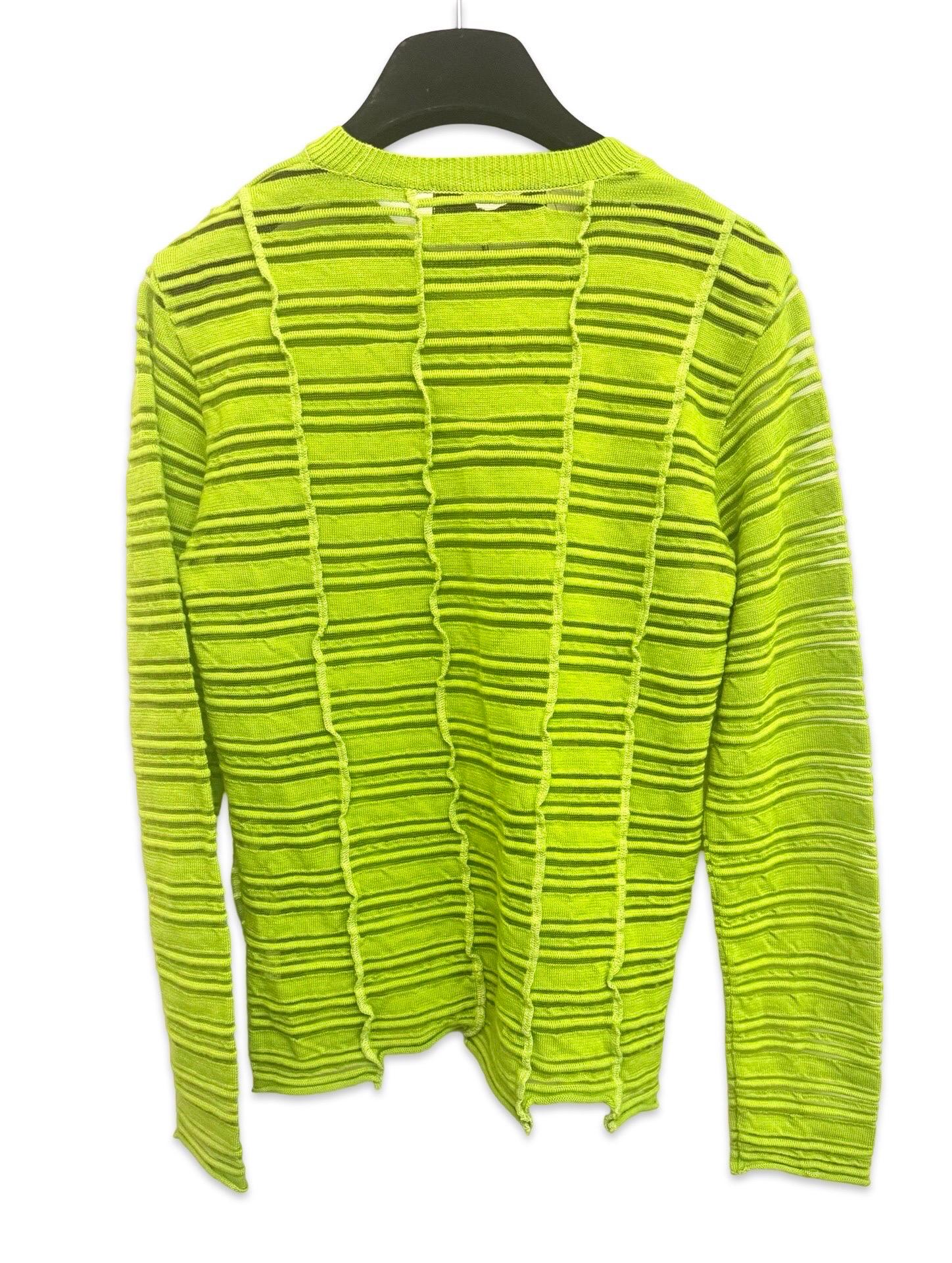 - Pull vintage 90s Comme Des Garcons Tricot vert en laine, circa Fall 1995. 

- Taille petite à moyenne. 

- 97 % laine, 3 % nylon. 

