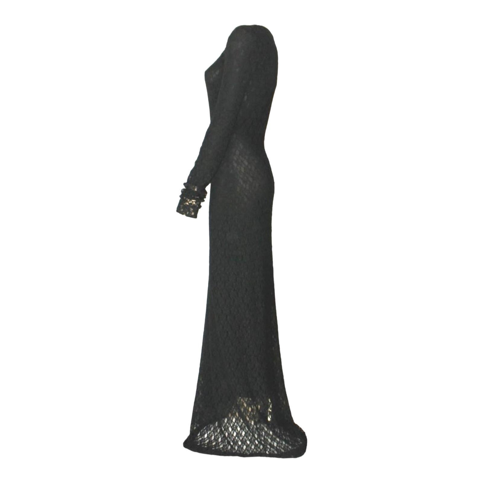 A stunning evening gown by Dolce & Gabbana
This dress dates back to the early 1990s
This wonderful dress is made of a soft 3D structure crochet knit
The dress is fully lined
(Lining could be removed if needed for a more revealing look and worn with
