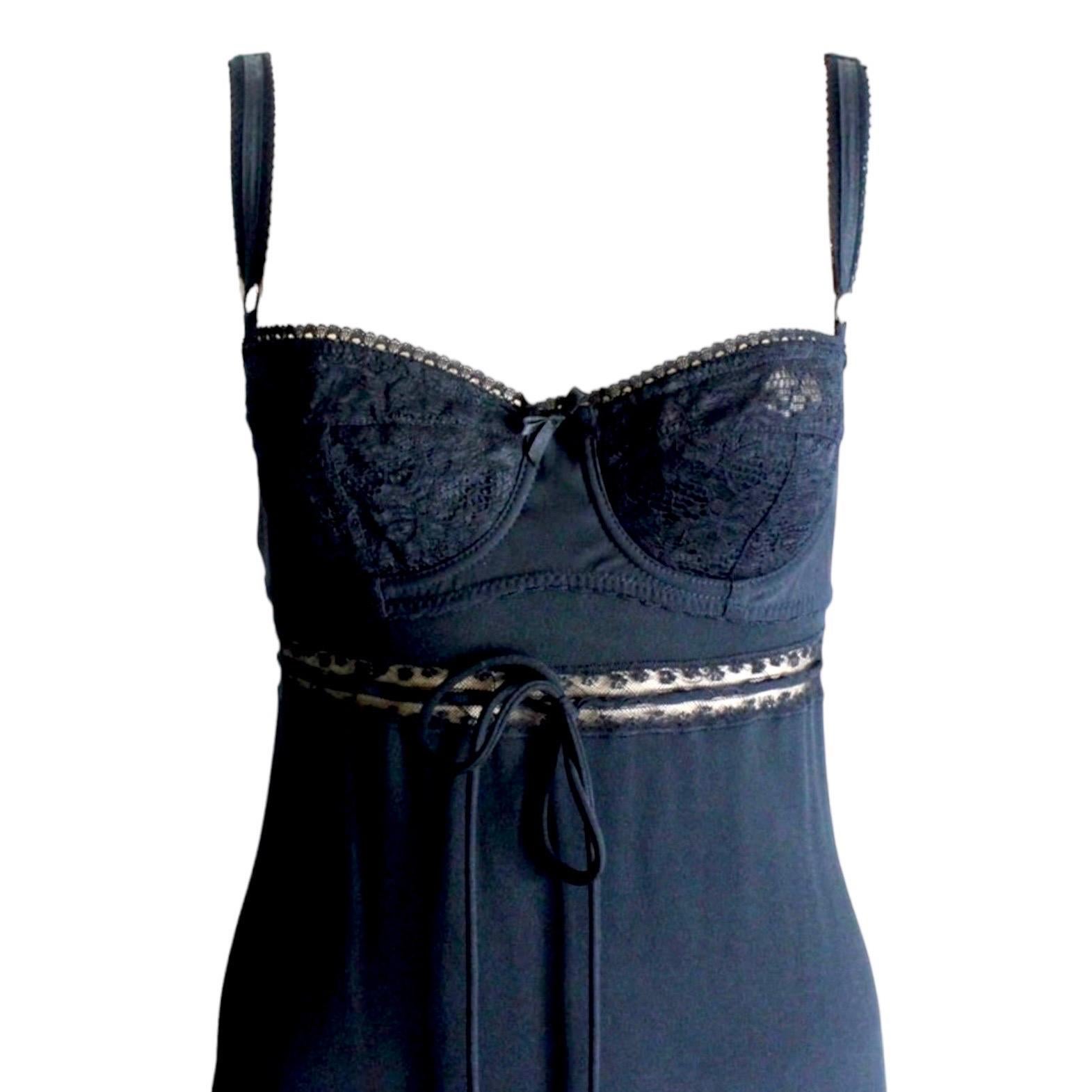     A DOLCE & GABBANA classic signature piece that will last you for years
    From the 1997 collection 
    Made out of a fantastic soft black fabric
    Drawstring detail with lace
Size 42
    Dry Clean Only
    Made in Italy
Please refer to AD
