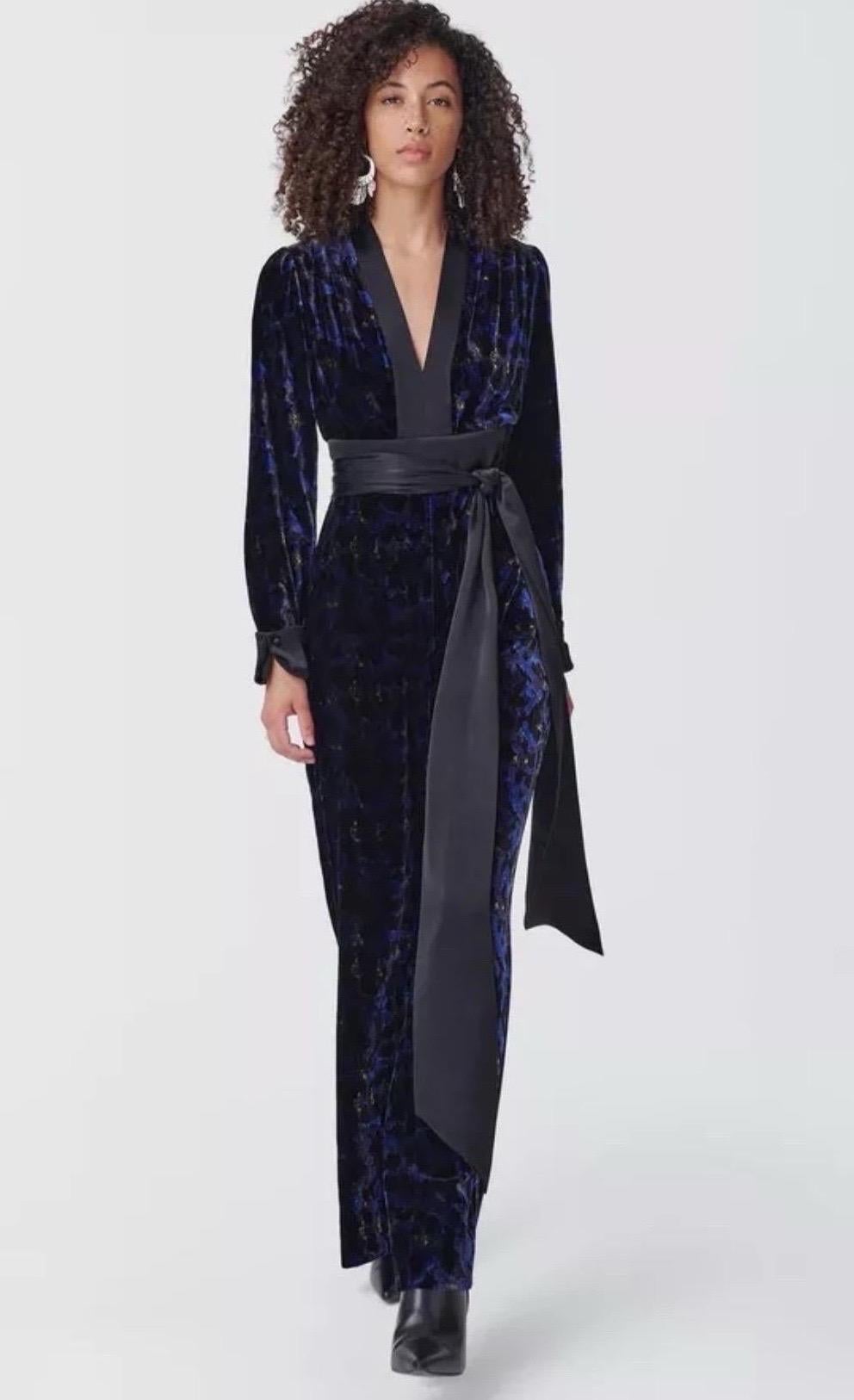 This Diane von Furstenberg's stunning jumpsuit is made from plush velvet patterned in an abstract leopard-print motif. It's designed with satin trims including a wide, self-tie belt to define your figure and has a loose shape enhanced by gathered