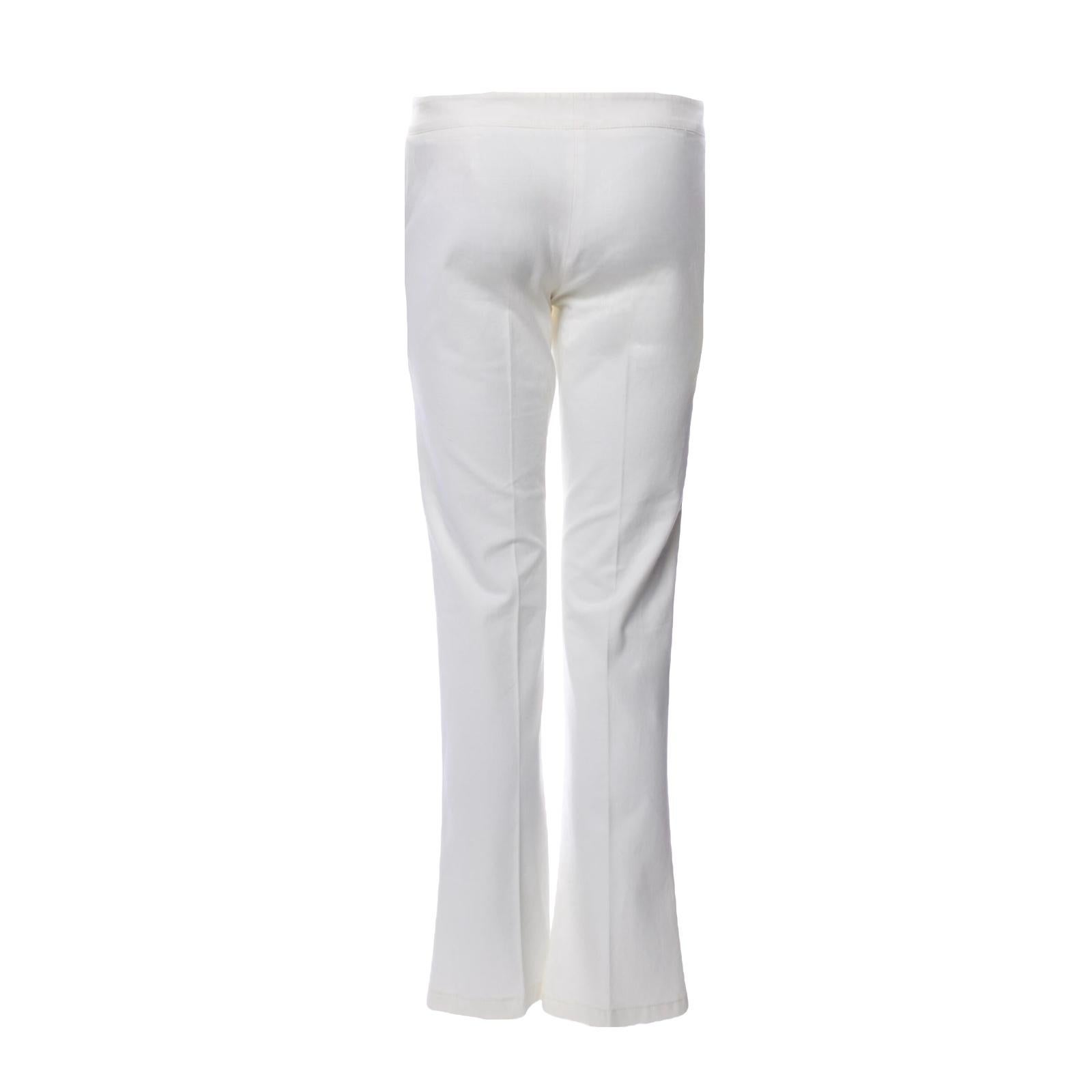 These trousers channel Pucci's love of statement 70s silhouettes. Rendered in bright white, they boast a flared crop fit.

Details:

Flared pants
Pressed creases
Two side zip pockets
Light-gold hardware engraved with 