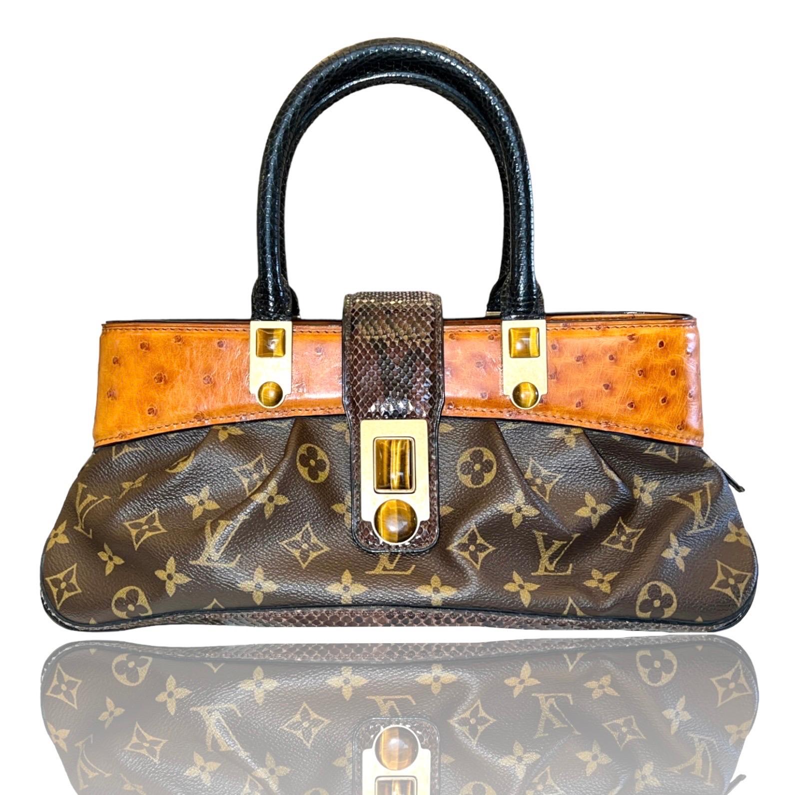 Louis Vuitton by Marc Jacobs FW 2005 bag
As seen on Uma Thurman
Gorgeous Monogram Canvas combined with precious exotic skins - a dream!

Details:

A Louis Vuitton signature piece that will last you for many years, from one of Vuitton's most stunning