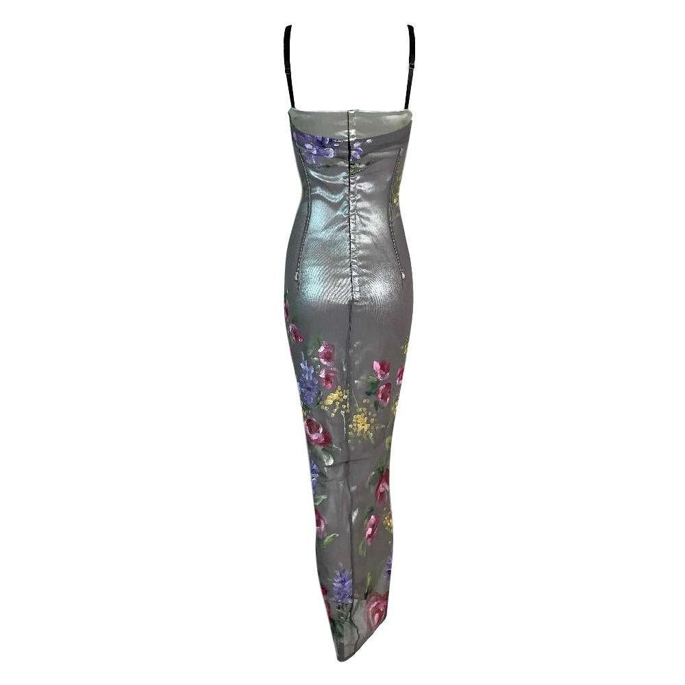 DESIGNER: F/W 1998 Dolce & Gabbana Runway- double layer dress- inner dress is a silver stretch and top dress is a painted mesh. 

Please contact for more information and/or photos.

CONDITION: Unworn- flawless

FABRIC: Polyester- Cotton-