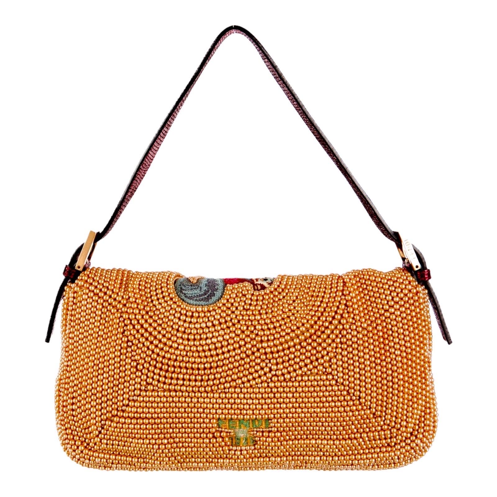 Special Piece, ultrarare collector's Baguette bag by FENDI

Golden bead-embellished bag
Hand-embroidery on top and back
