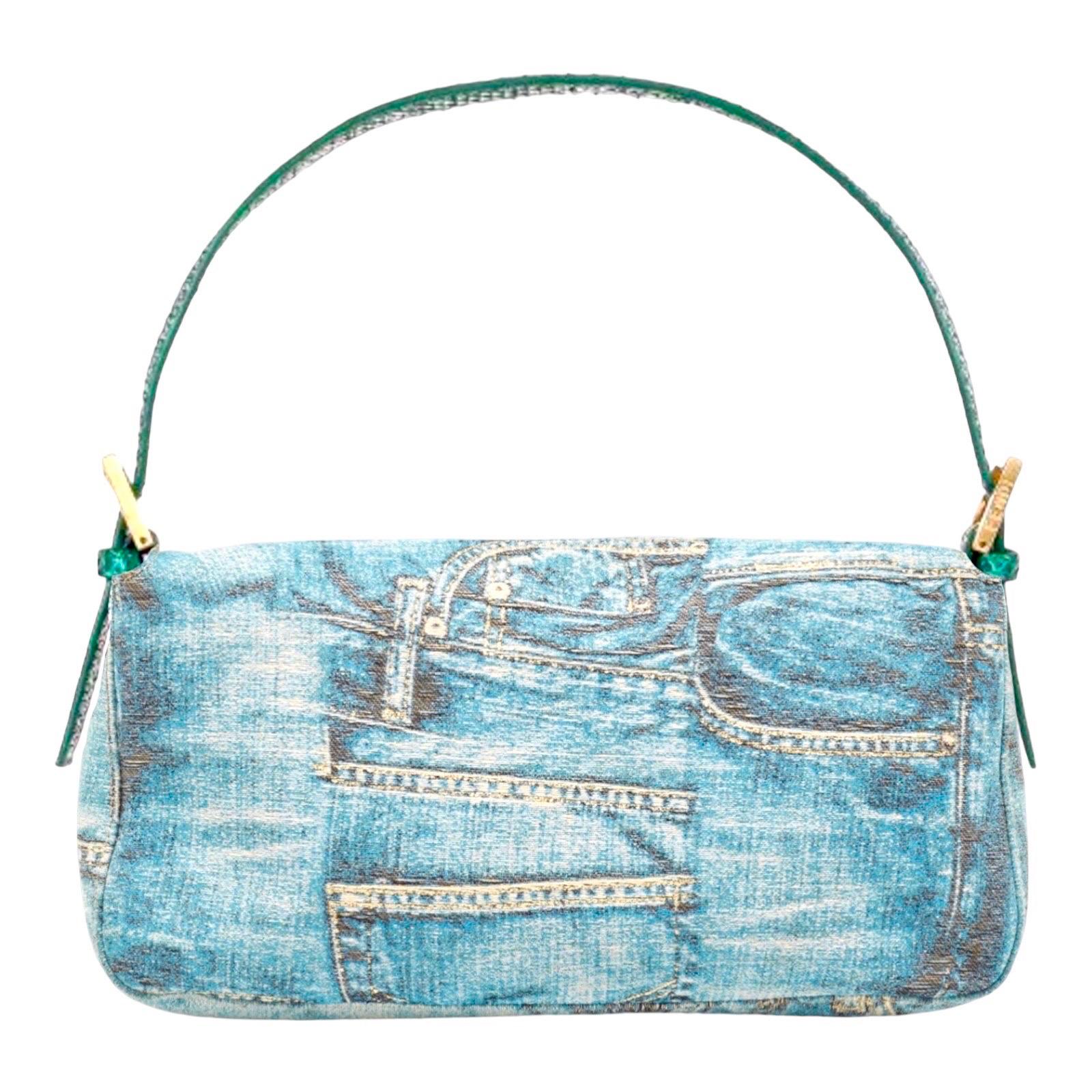 Rare find! FENDI Baguette vintage shoulder bag in jeans print with a twist - in shiny lurex and luxurious exotic leathers trimming.
This bag was featured in the Baguettemania exhibition celebrating 15 years Baguette at Colette Paris and is