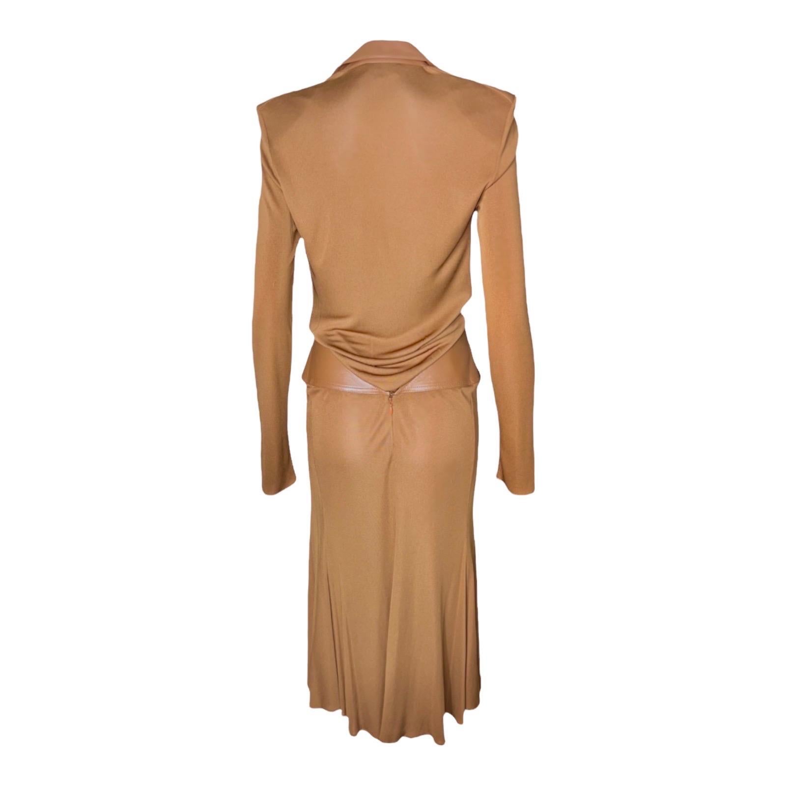 HOT HOT HOT

GIANNI VERSACE COUTURE

AS SHOWN ON THE RUNWAY SHOW AND AD CAMPAIGN

SOLD OUT IMMEDIATELY
Impossible to find!
A true gem! This is a very rare and out-of-the-ordinary gown
From the VERSACE Fall 2001 collection
In a rare cognac color for