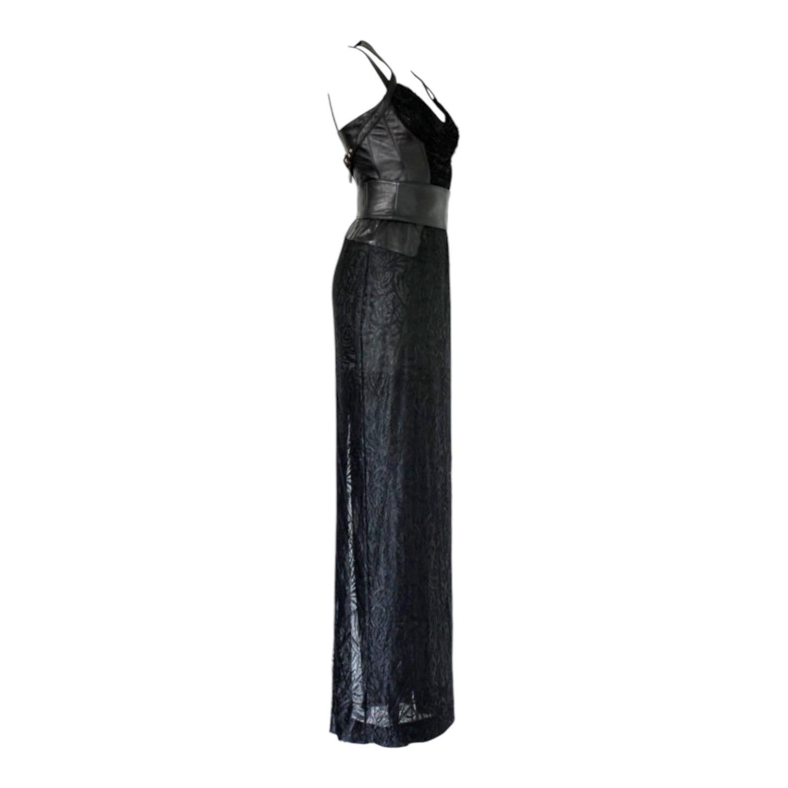 A True Collector's Item
A very rare and stunning signature piece
Black evening gown with sexy slit
Bondage style
Draped corset-style upper part
Trimmed with softest nappa leather
Detachable corset belt
Full length
Made in Italy
Dry Clean Only
Size