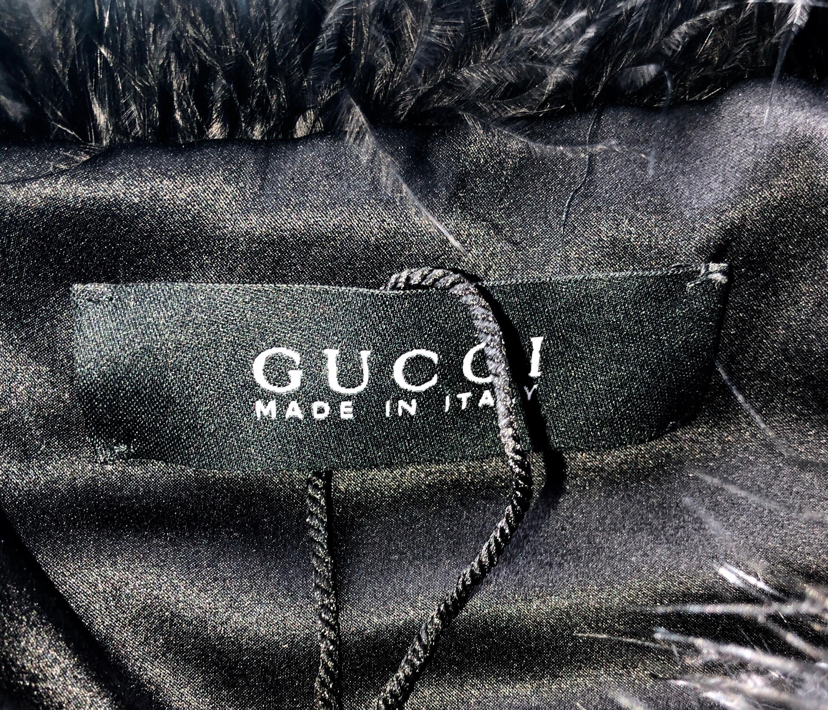 GORGEOUS

GUCCI BLACK MARABOU FEATHER JACKET

FROM TOM FORD'S LAST SUMMER COLLECTION FOR GUCCI IN 2004

COLLECTOR'S PIECE

SHOWN ON RUNWAY SHOW SS 2004 AS WELL AS IN THE GUCCI AD CAMPAIGN

ONLY VERY FEW PIECES MADE
SOLD OUT IMMEDIATELY

This