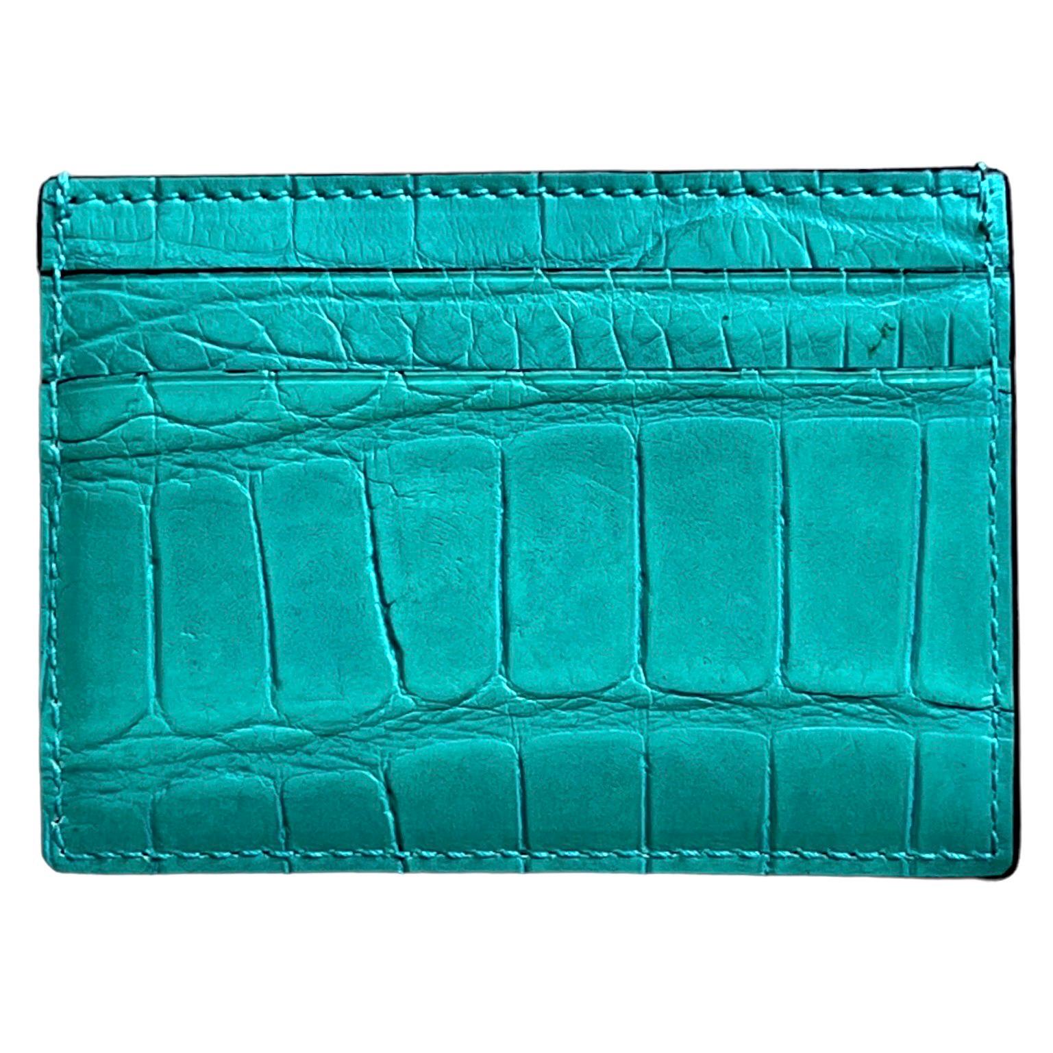 Precious leathers appear throughout the Gucci Exotics collection, their delicate textures add a unique note to the classic silhouette. 

Wonderful card case made from precious exotic crocodile skin
A rare and very special color and finishing - you