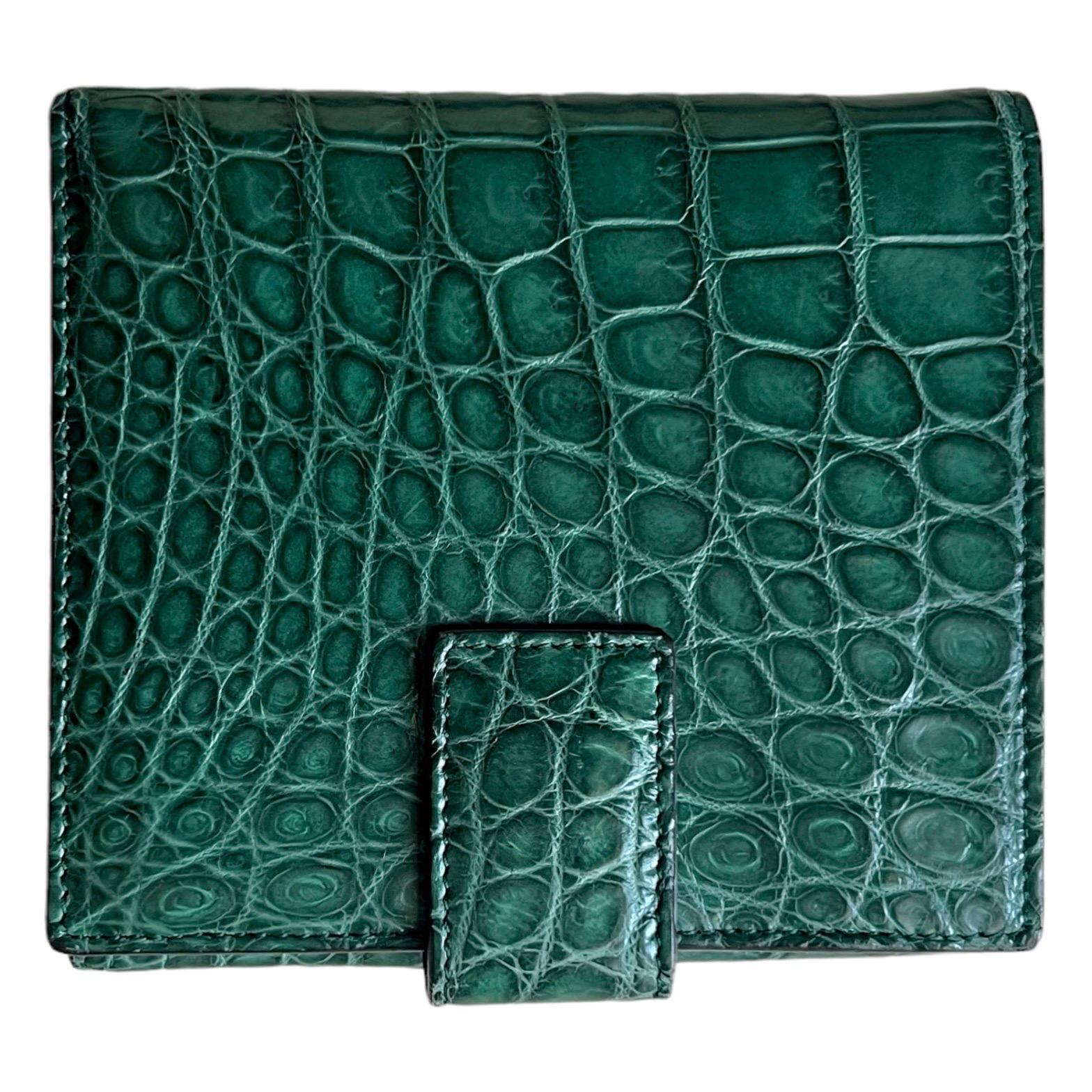 Precious leathers appear throughout the Gucci Exotics collection, their delicate textures add a unique note to the classic silhouette. 


    Black crocodile

    Horsebit
    Inside: 8 card slots and 2 bill compartments
    Weight: 0.7kg