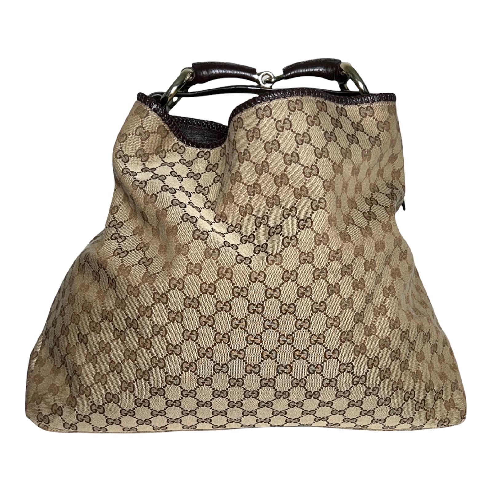 

GUCCI MONOGRAM GG HORSEBIT HOBO BAG

XL SIZE

DETAILS: 
A GUCCI signature piece that will last you for many years
Timeless classic - a true beauty!
Made of GG Monogram printed canvas fabric
A truly luxurious and elegant piece
Completely lined with