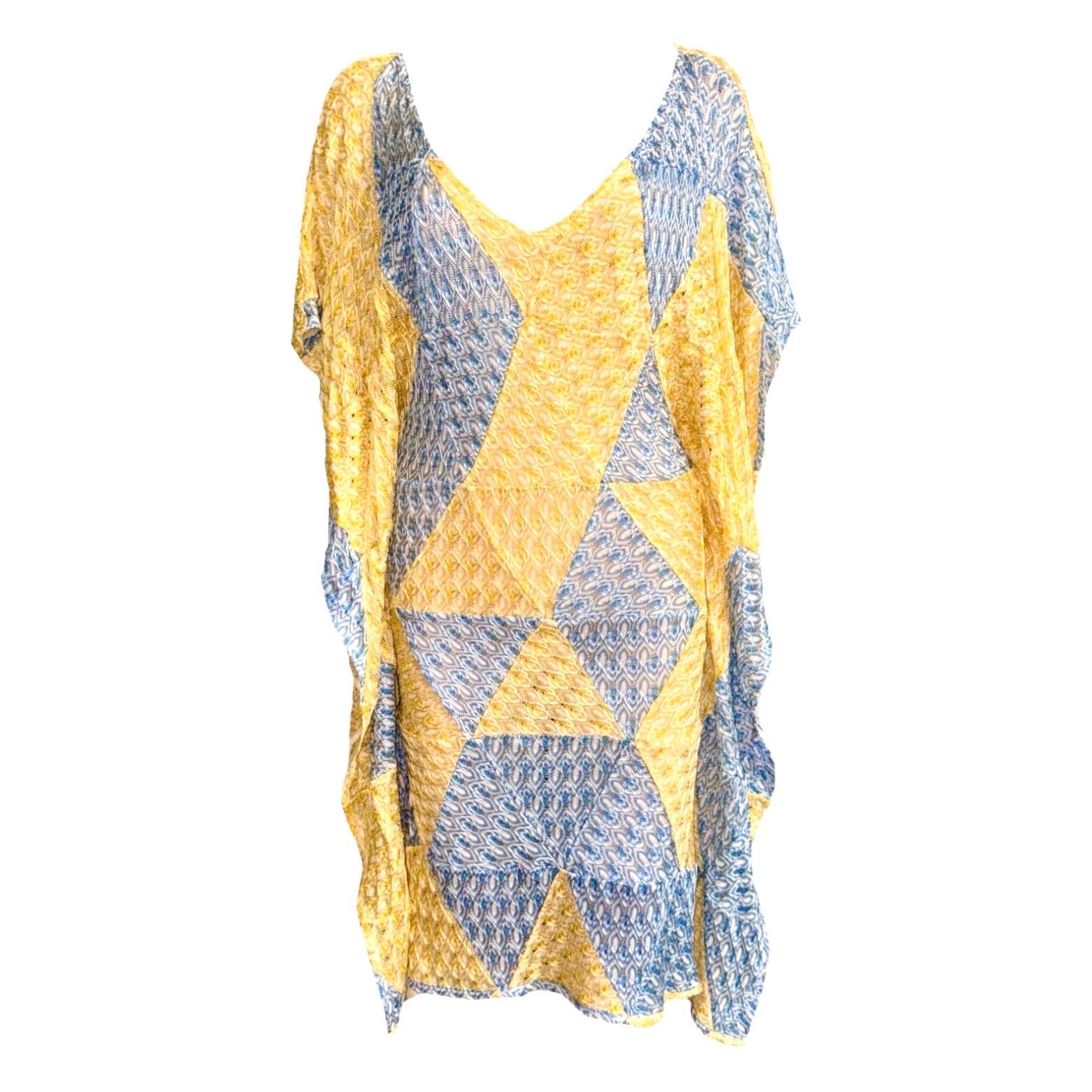 Missoni's signature crochet-knit kaftans are a vacation staple. Yellow and blue tones make this dress style perfect for sun-soaked beach resorts.

Stunning MISSONI kaftan dress 
Fantastic blue & yellow colors
Great trimming 
MISSONI signature zigzag