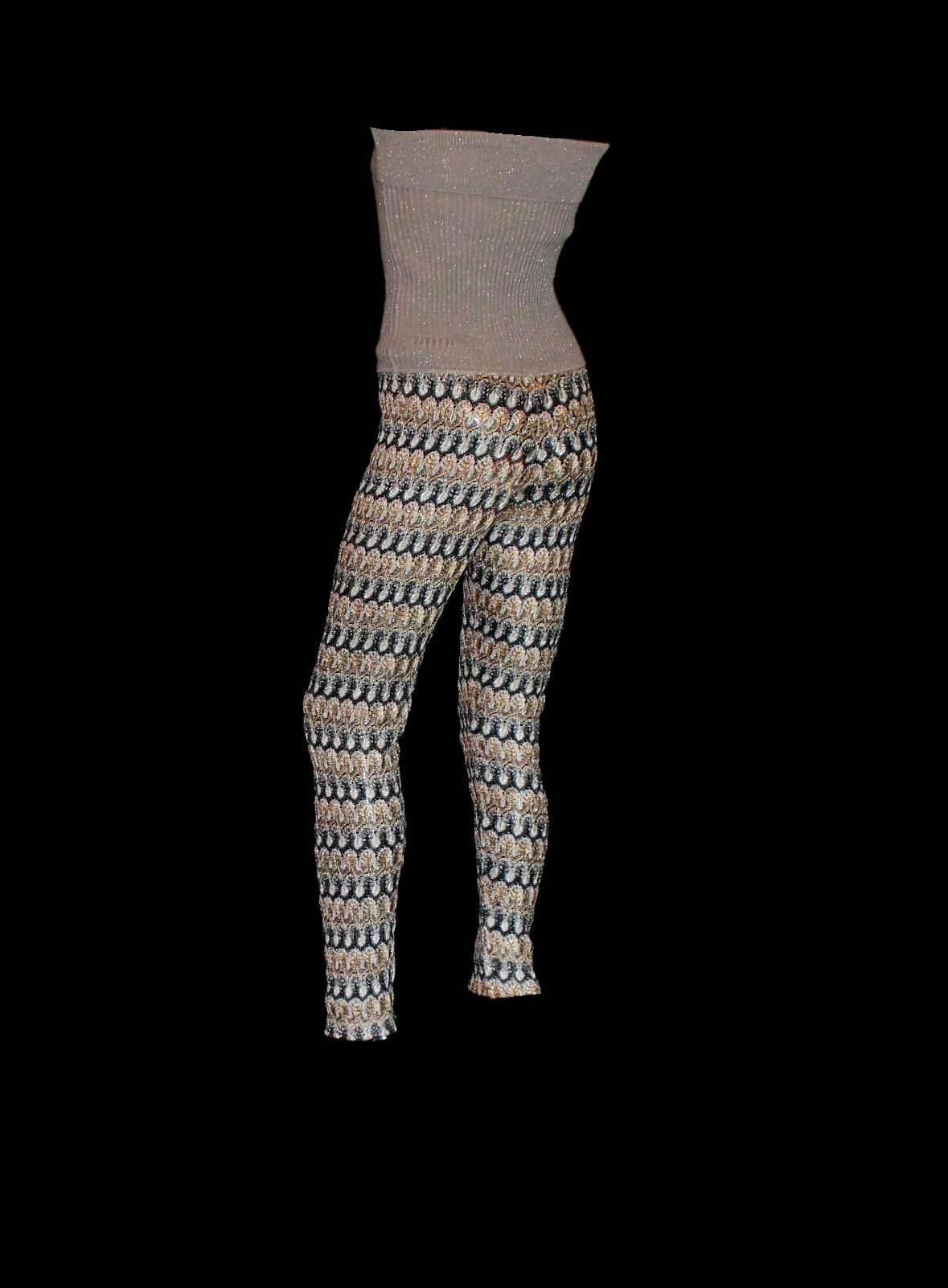 Beautiful MISSONI jumpsuit
Classic signature zigzag crochet knit in lurex metallic
Simply slips on
Bandeau upper part with ribbed structure 
Gorgeous crochet knit legs
Dry Clean only
Made in Italy
Unworn