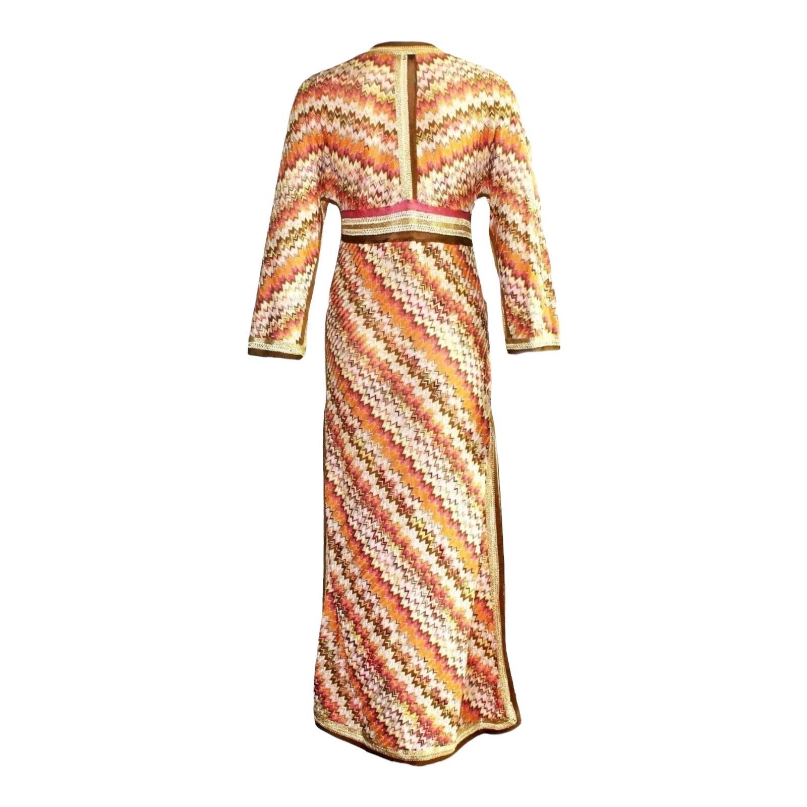 Beautiful multicolored golden lurex Missoni kaftan maxi dress
Classic Missoni signature knit
Simply slips on
Deep V-Neck
Crochet-knit detail trimming
Dry Clean only
Made in Italy
Size 40
Unworn