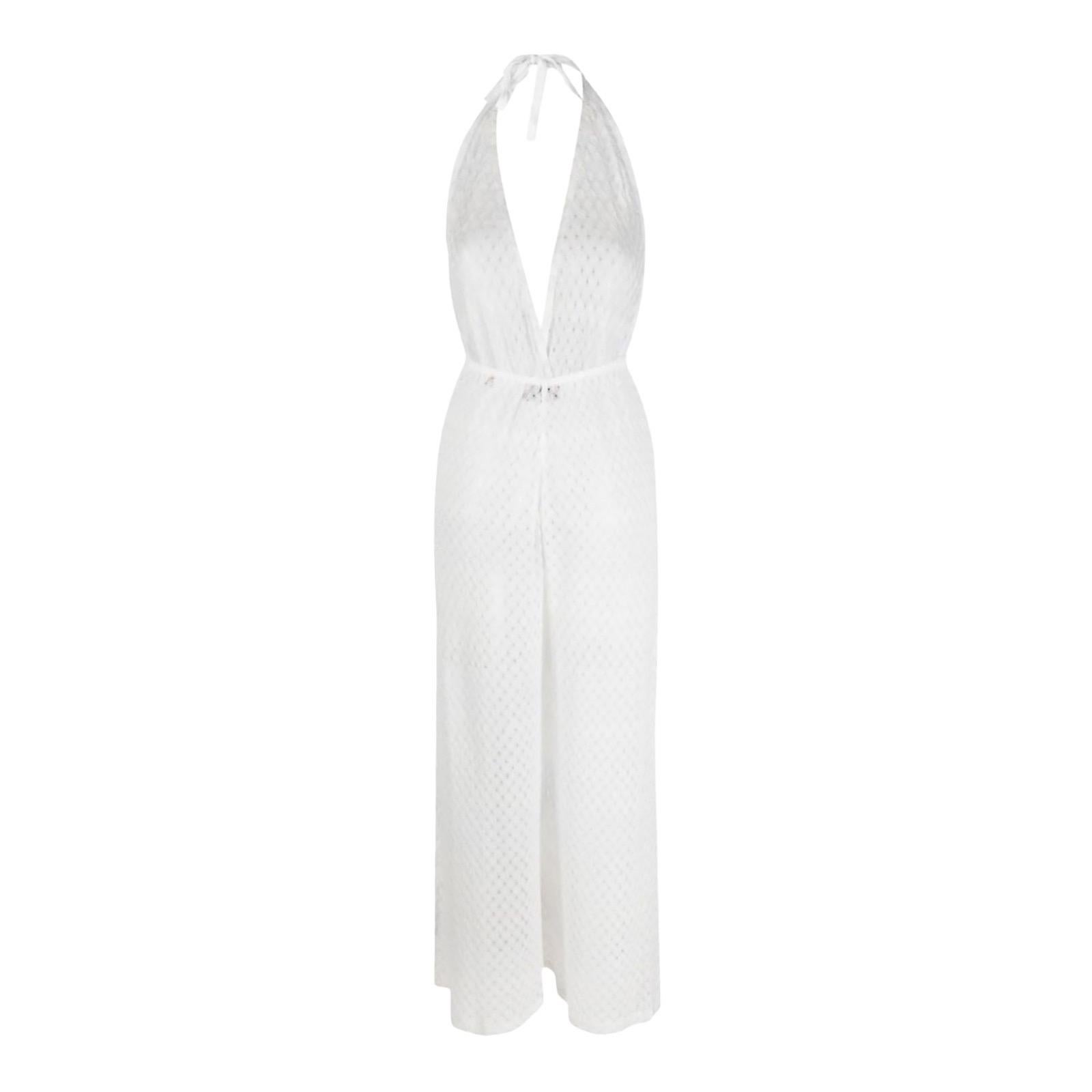 Missoni exude effortless vacation glamour. Spun from a signature zigzag knit, this white jumpsuit falls in loose legs. The elasticated waistband ensures they are easy to slip on. 



Jumpsuit with deep front neckline tied at the neck
Elasticized