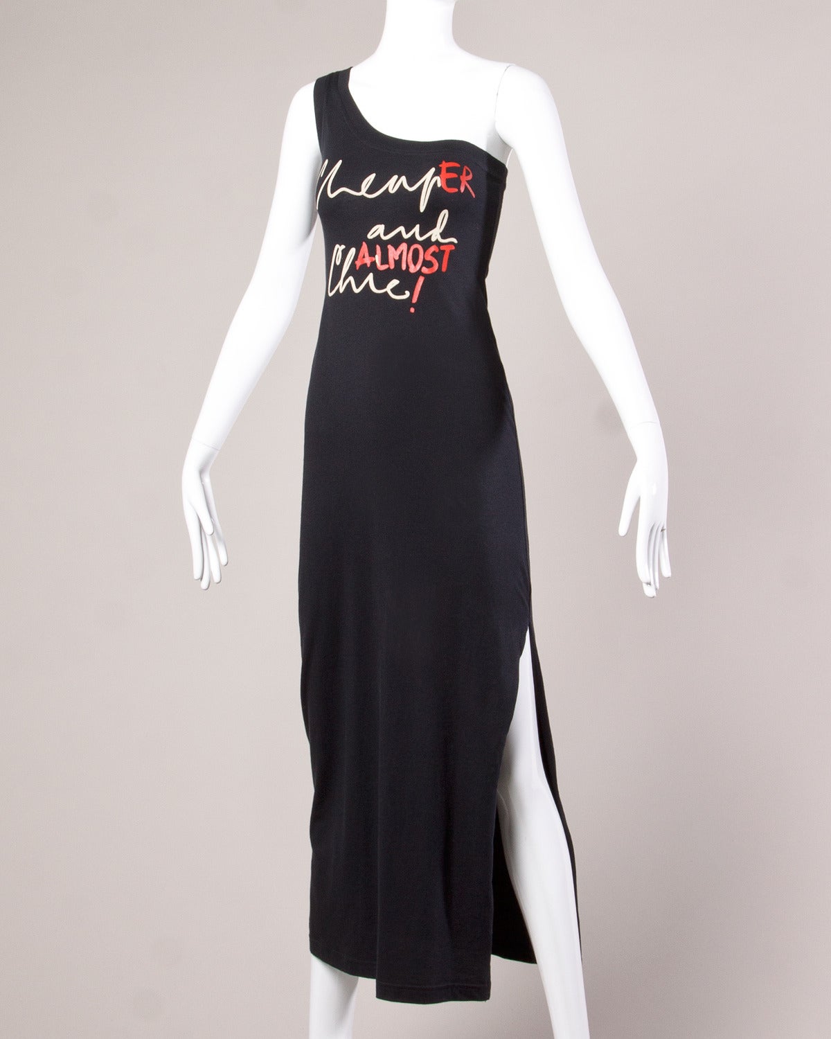 Unworn with the original tags still attached! Vintage Moschino one-shoulder maxi dress with a graphic that reads, 