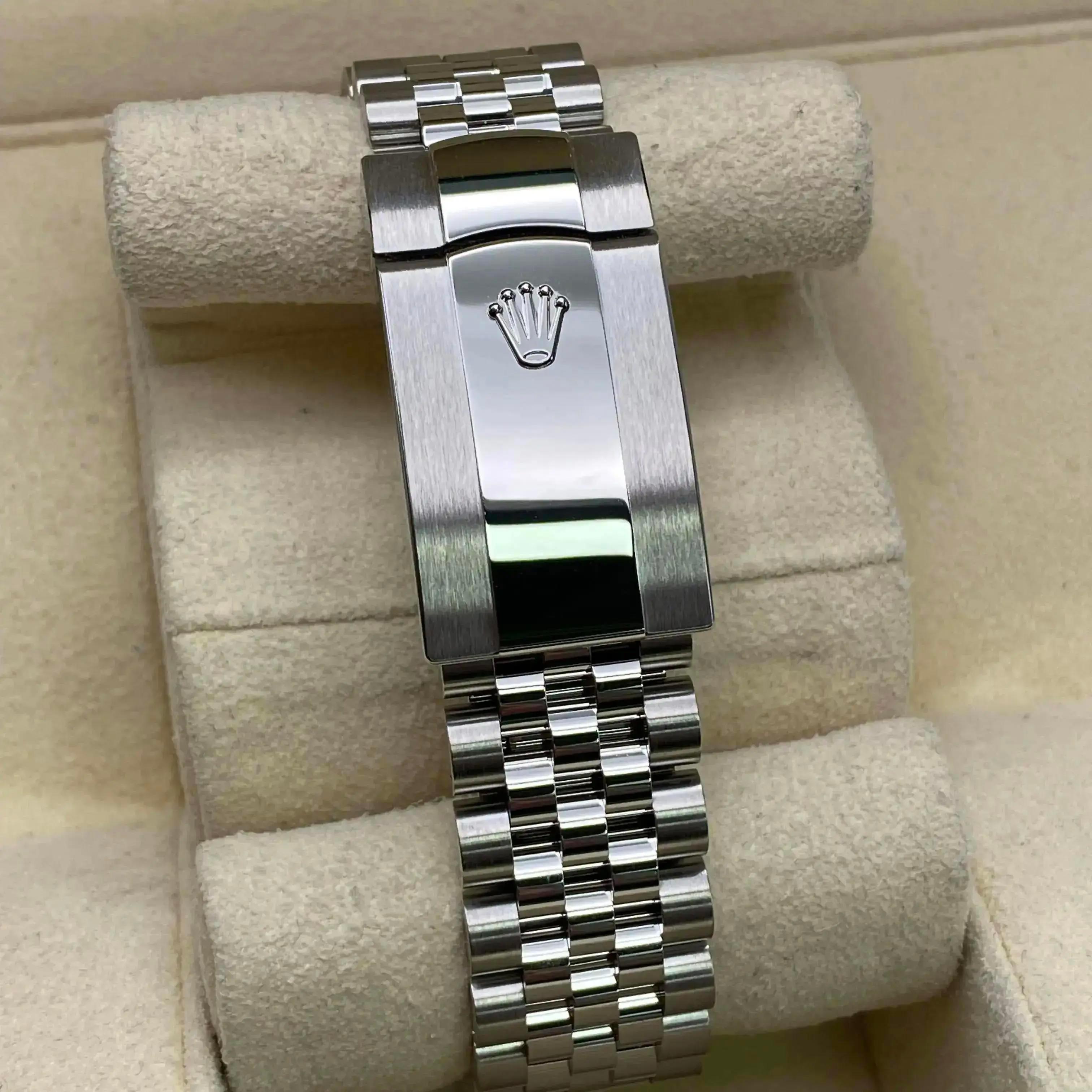 Unworn Rolex Datejust 126200 Jubilee Steel White Roman Dial Automatic Watch B&P For Sale 1