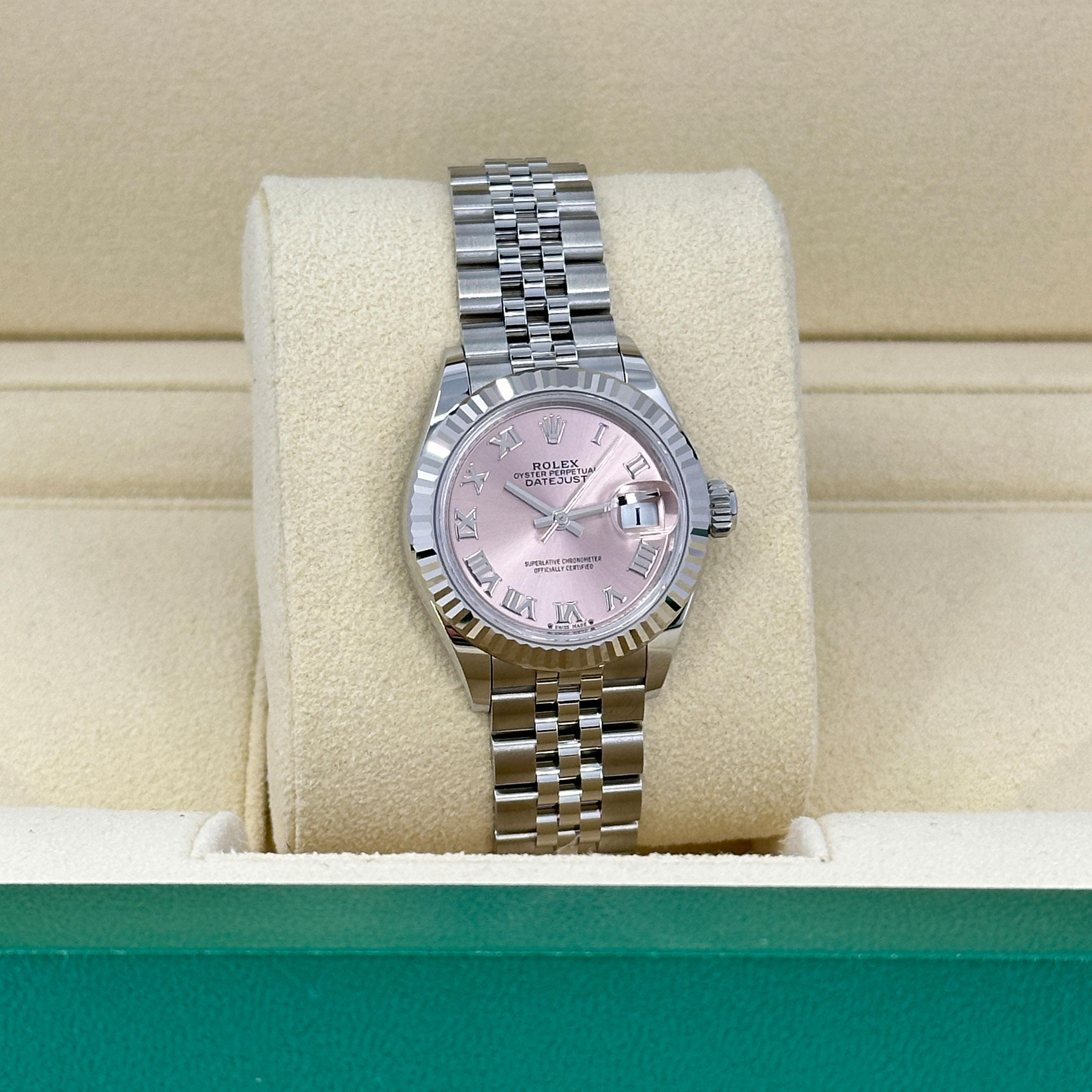 The Rolex Datejust 28 279174-0017 is a stunning expression of timeless elegance and refined craftsmanship, perfectly tailored for the discerning wearer. This model features a 28mm Oystersteel case complemented by a luxurious 18k white gold fluted