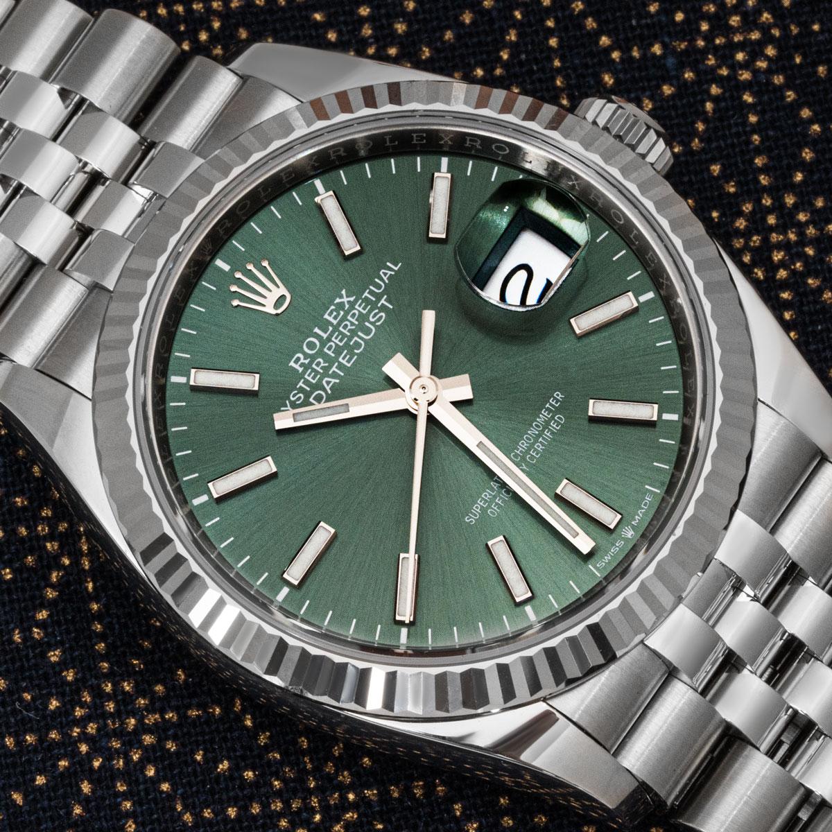 An Oystersteel 36mm Datejust from Rolex. Featuring the desired mint green dial with hour markers and a fluted bezel in white gold. Presented on a Jubilee bracelet with an Oysterclasp. The watch is fitted with a scratch-resistant sapphire crystal and