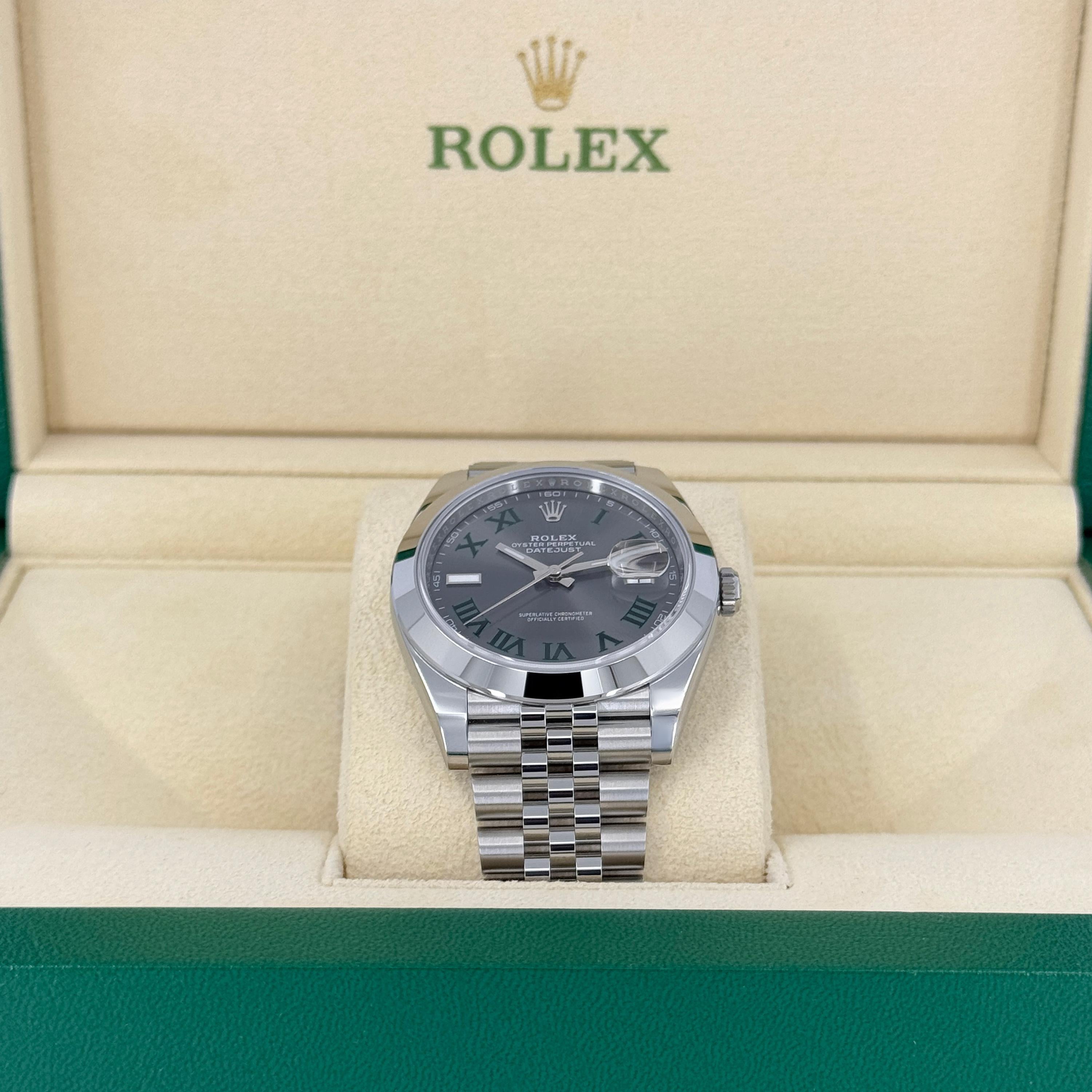 Rolex Datejust 126300-0014 – Slate Dial Sophistication with Full Oystersteel Presence

The Rolex Datejust 126300-0014 brings understated elegance and modern precision together in a robust 41mm all-Oystersteel design. Featuring a smooth bezel and