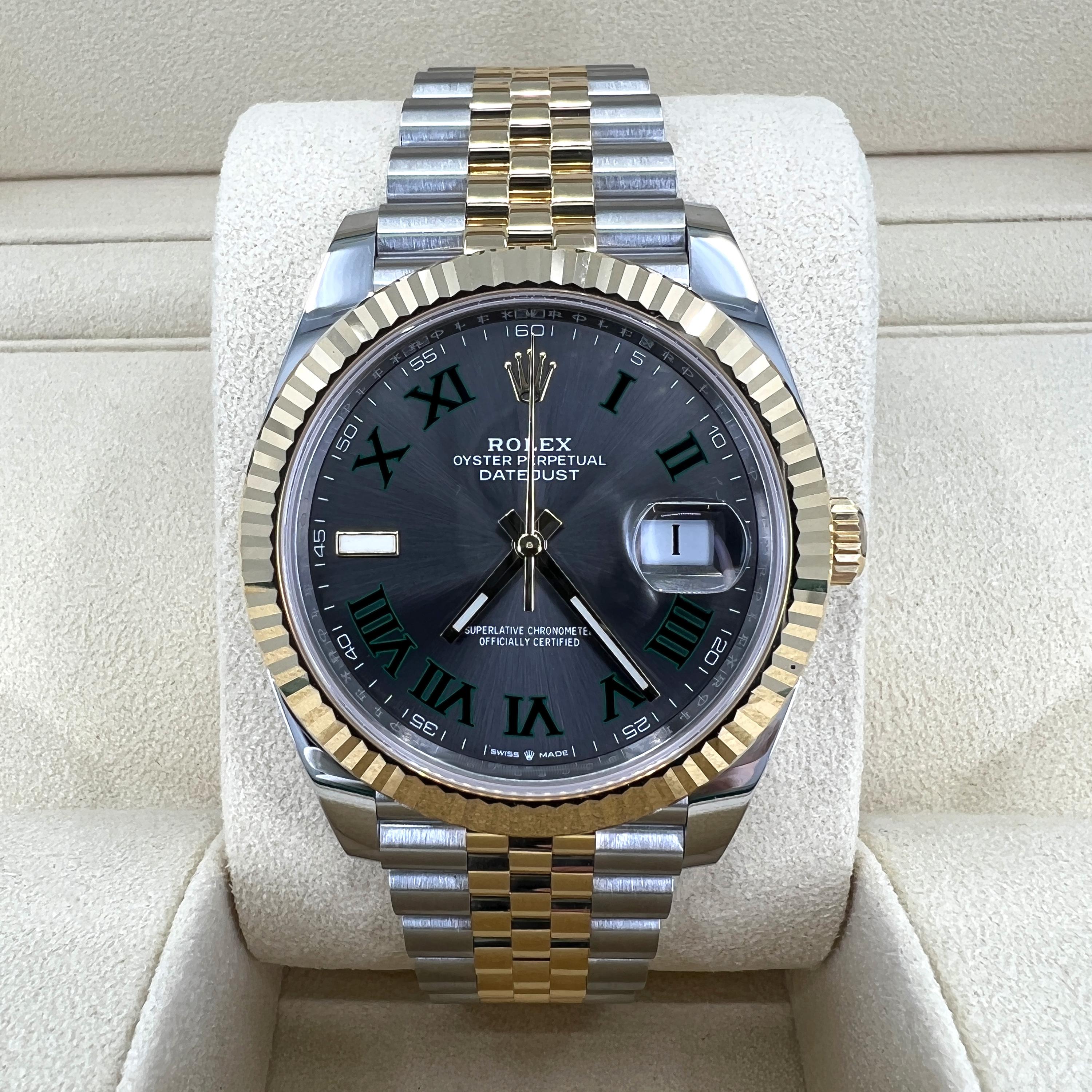 Rolex Datejust 126333-0020 – Yellow Rolesor Sophistication with Wimbledon Slate Dial

A distinctive take on an icon, the Rolex Datejust 126333-0020 blends timeless elegance with a bold design twist. Featuring a 41mm case in Yellow Rolesor—a refined