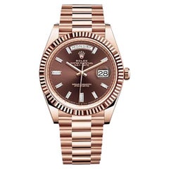 Used Unworn Rolex Daydate 40 18k Rose Gold Chocolate Baguette Diamond Dial Ref 228235