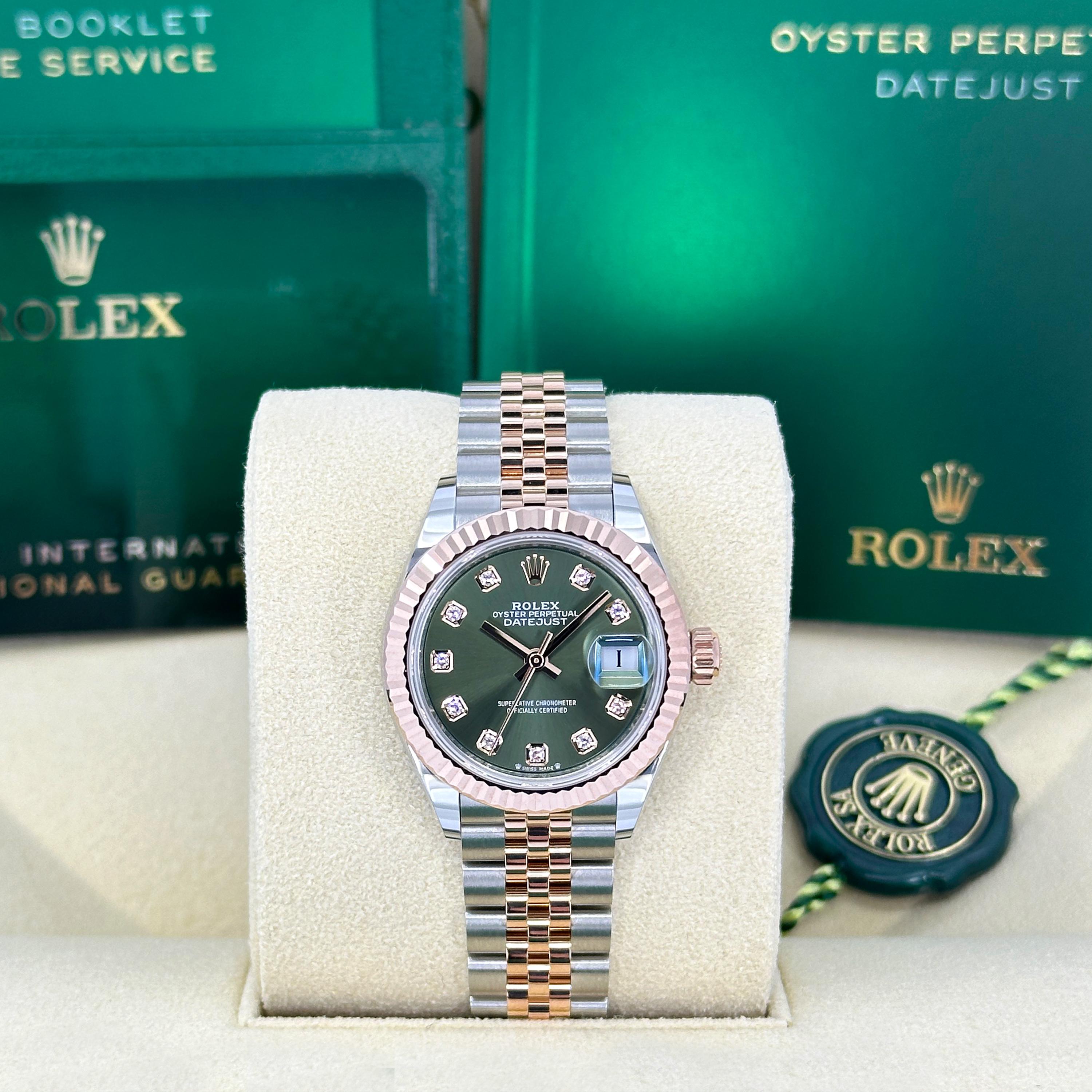 The Rolex Lady-Datejust 28 Ref. 279171-0007 beautifully combines timeless luxury with contemporary sophistication. Crafted from Everose Rolesor — Rolex’s signature fusion of durable Oystersteel and 18k Everose Gold — this exquisite 28mm timepiece